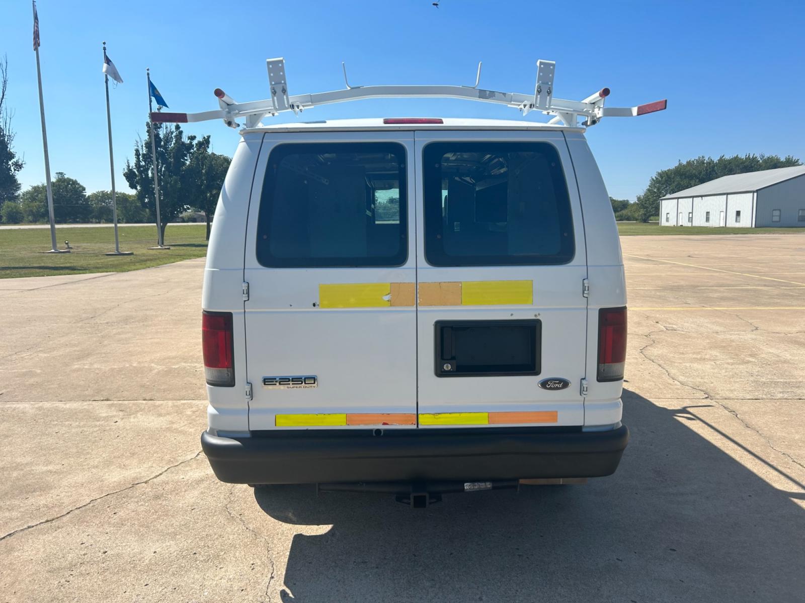 2010 White Ford E-Series Van E-250 (1FTNE2EL9AD) with an 5.4L V8 SOHC 16V engine, 4-Speed Automatic transmission, located at 17760 Hwy 62, Morris, OK, 74445, (918) 733-4887, 35.609104, -95.877060 - Photo #6