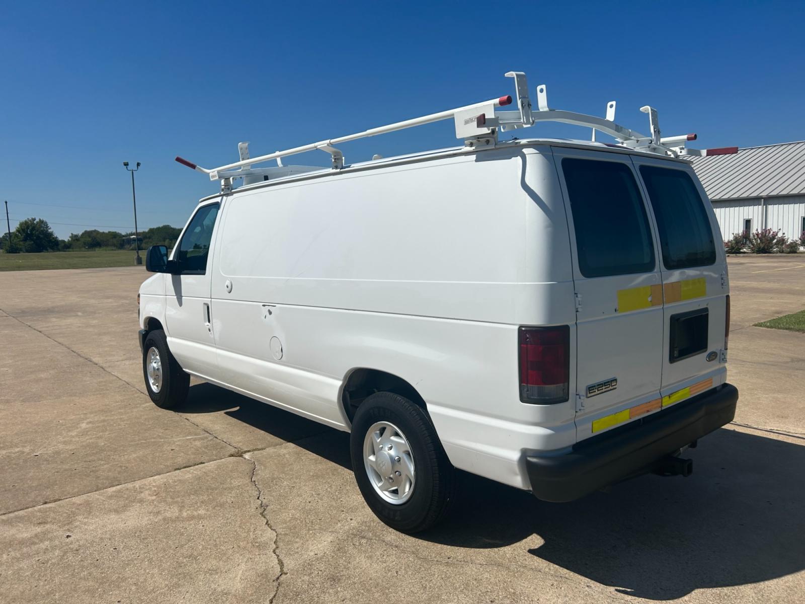 2010 White Ford E-Series Van E-250 (1FTNE2EL9AD) with an 5.4L V8 SOHC 16V engine, 4-Speed Automatic transmission, located at 17760 Hwy 62, Morris, OK, 74445, (918) 733-4887, 35.609104, -95.877060 - Photo #7