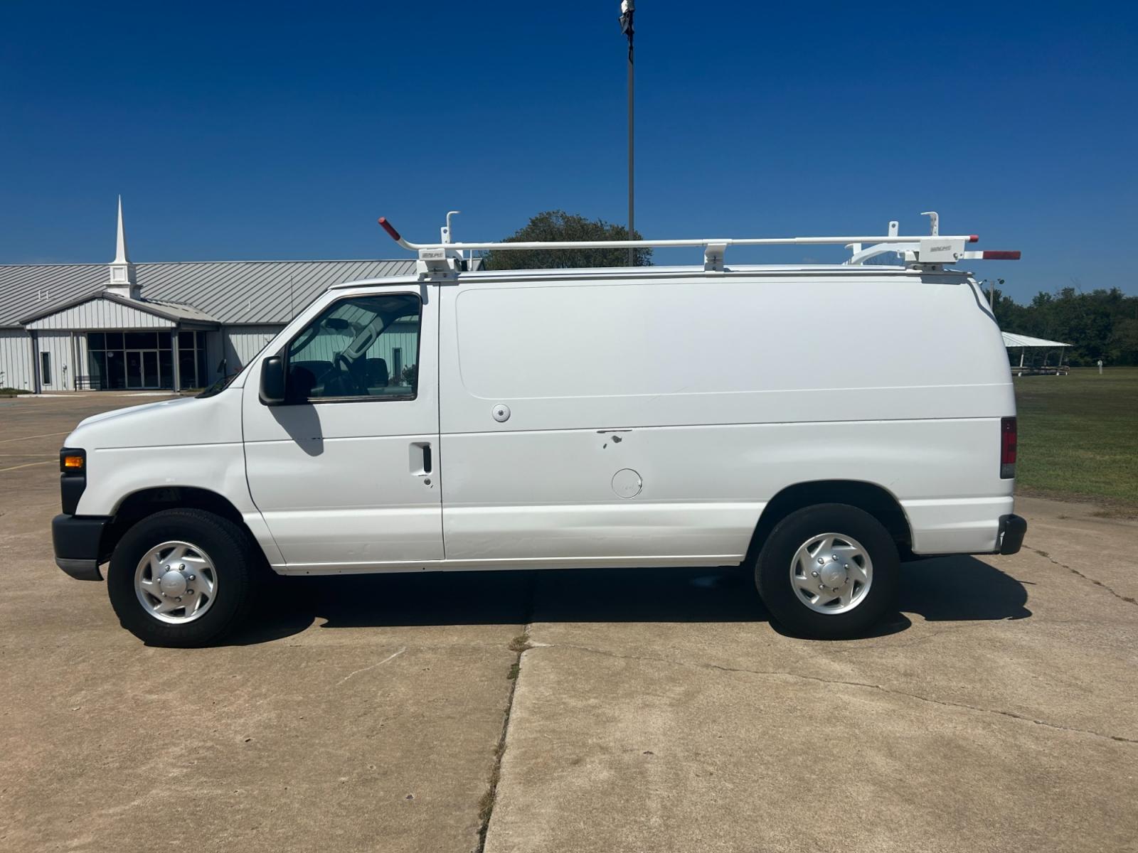 2010 White Ford E-Series Van E-250 (1FTNE2EL9AD) with an 5.4L V8 SOHC 16V engine, 4-Speed Automatic transmission, located at 17760 Hwy 62, Morris, OK, 74445, (918) 733-4887, 35.609104, -95.877060 - Photo #8