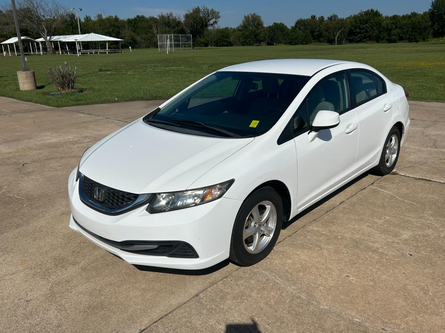 2013 White Honda Civic CNG Sedan 5-Speed AT (19XFB5F54DE) with an 1.8L L4 SOHC 16V CNG engine, 5A transmission, located at 17760 Hwy 62, Morris, OK, 74445, (918) 733-4887, 35.609104, -95.877060 - 2013 HONDA CIVIC CNG SEDAN 5-SPEED AT 1.8L DEDICATED CNG (ONLY RUNS ON COMPRESSED NATURAL GAS) FEATURES POWER LOCKS, POWER WINDOWS, POWER MIRRORS, AM/FM STEREO, CD PLAYER, AUXILLARY PORT, CRUISE CONTROL, TRACTION CONTROL, MULTI-FUNCTIONING STEERING WHEEL CONTROLS, BACK-UP CAMERA. IT HAS 195/65R15 TI - Photo#0