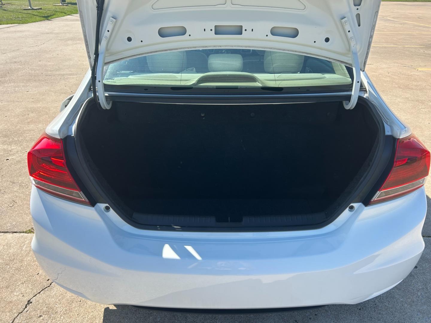 2013 White Honda Civic CNG Sedan 5-Speed AT (19XFB5F54DE) with an 1.8L L4 SOHC 16V CNG engine, 5A transmission, located at 17760 Hwy 62, Morris, OK, 74445, (918) 733-4887, 35.609104, -95.877060 - 2013 HONDA CIVIC CNG SEDAN 5-SPEED AT 1.8L DEDICATED CNG (ONLY RUNS ON COMPRESSED NATURAL GAS) FEATURES POWER LOCKS, POWER WINDOWS, POWER MIRRORS, AM/FM STEREO, CD PLAYER, AUXILLARY PORT, CRUISE CONTROL, TRACTION CONTROL, MULTI-FUNCTIONING STEERING WHEEL CONTROLS, BACK-UP CAMERA. IT HAS 195/65R15 TI - Photo#16