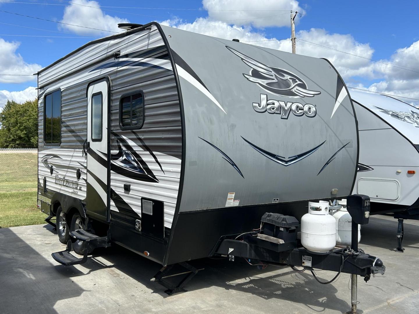 2018 Silver JAYCO OCTANE (1UJBJSBJXJ1) , located at 17760 Hwy 62, Morris, OK, 74445, 35.609104, -95.877060 - 2018 JAYCO OCTANE SUPER LITE 161 TOYHAULER IS 16FT, FEATURES STAINLESS STEEL APPLIANCES, SEAMLESS COUNTERTOPS, SPRING ASSIST REAR RAMP DOOR, SLIDE DOWN SCREEN DOOR, REAR ELECTRIC QUEEN BED WITH ROLLOVER SOFA, TUB/SHOWER COMBO, INTERIOR/EXTERIOR SPEAKERS, OUTSIDE SHOWER, AND AN OUTSIDE AUXILIARY FUEL - Photo#2
