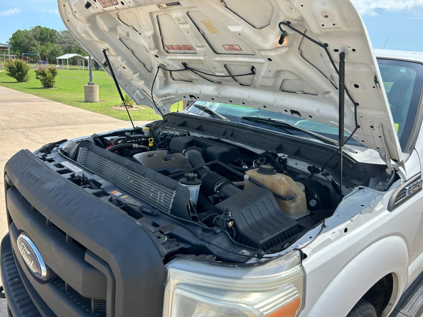 2012 White /Gray Ford F-250 SD SUPER DUTY (1FT7X2A66CE) with an 6.2L V8 OHV 16V engine, AUTOMATIC transmission, located at 17760 Hwy 62, Morris, OK, 74445, (918) 733-4887, 35.609104, -95.877060 - Photo#20