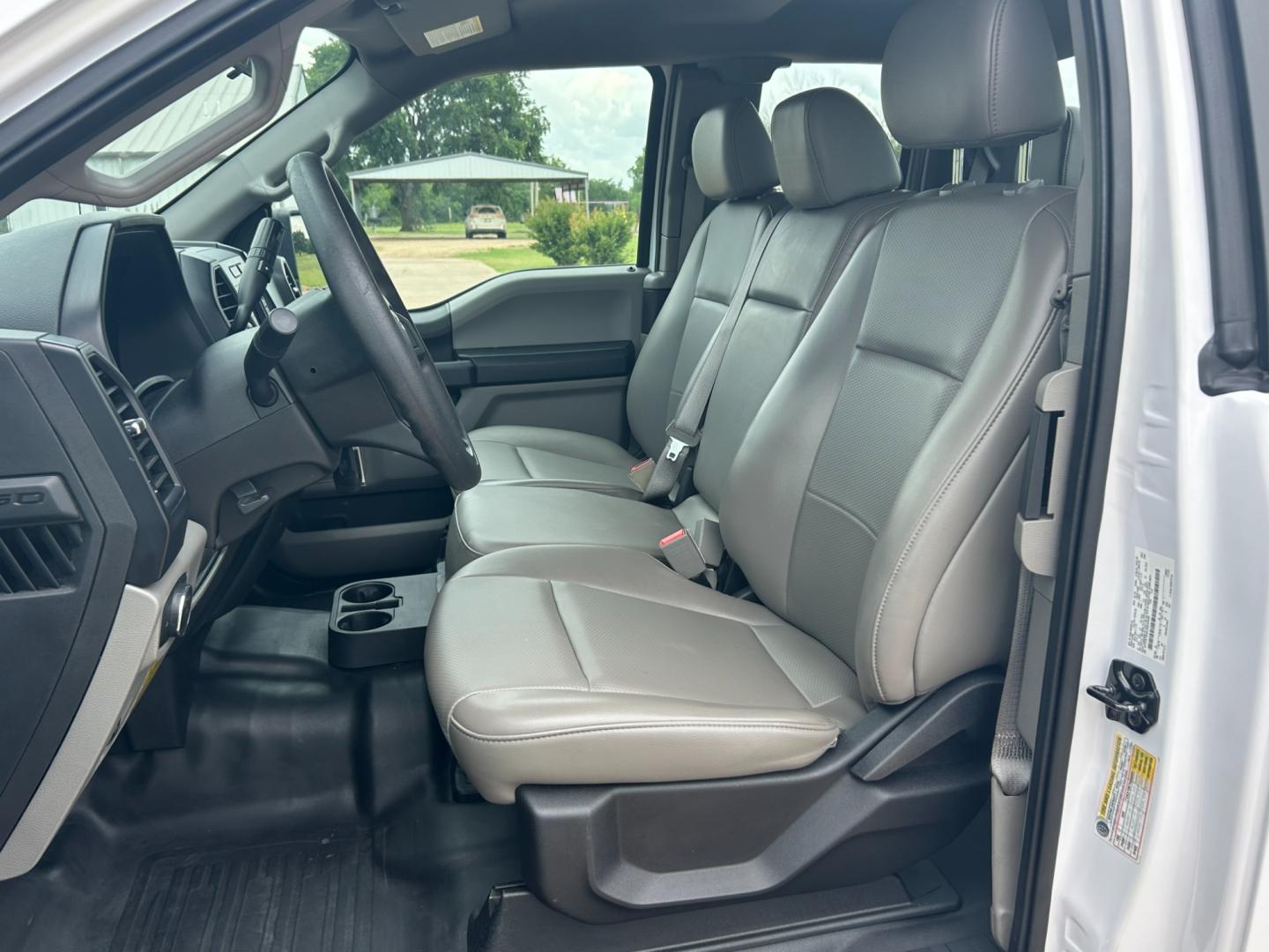 2018 White /Gray Ford F-150 EXTENDED CAB (1FTFX1E53JK) with an 5.0L V8 OHV 16V engine, AUTOMATIC transmission, located at 17760 Hwy 62, Morris, OK, 74445, (918) 733-4887, 35.609104, -95.877060 - 2018 FORD F150 HAS A 5.0L V8 ENGINE AND IS 4WD. FEATURES KEYLESS ENTERY, LEATHER INTERIOR, POWER WINDOWS, POWER LOCKS, POWER MIRRORS, AM/FM RADIO, A/C, TRACTION CONTROL, AUXILIARY PORT, BACKUP CAMERA, TILT STEERING WHEEL, BED COVER, AND BED LINER. EQUIPPED WITH A BI-FUEL CNG FUEL SYSTEM. IT RUNS ON - Photo#8