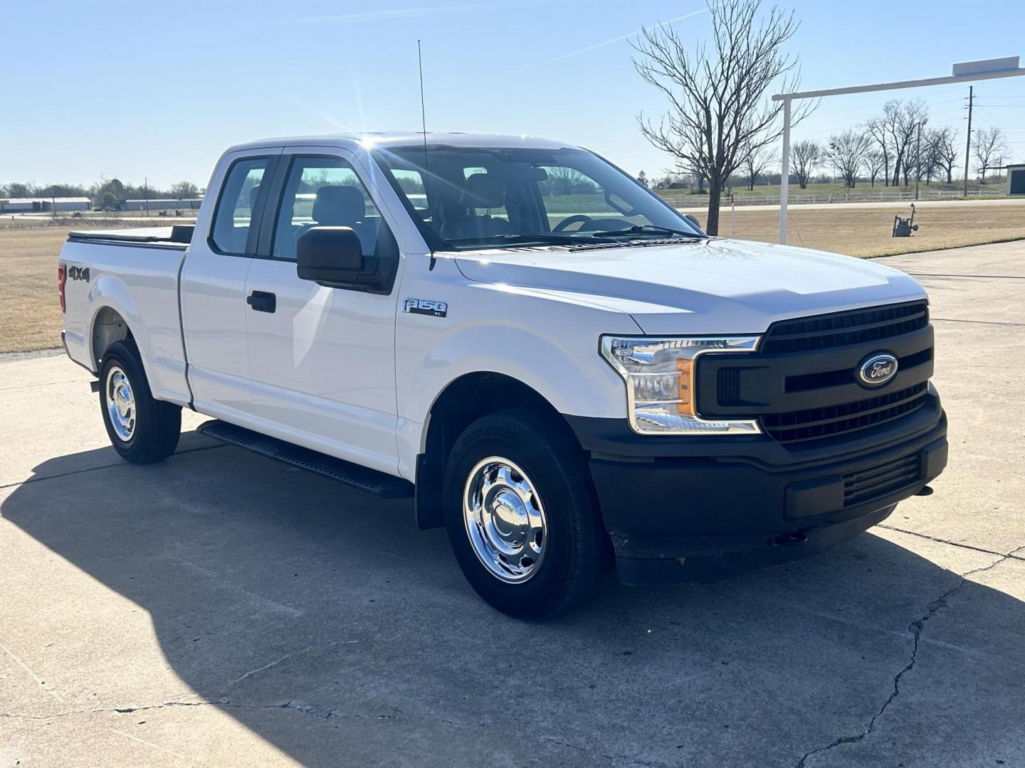 2018 White /Gray Ford F-150 EXTENDED CAB (1FTFX1E52JK) with an 5.0L V8 OHV 16V engine, 10 SPEED AUTOMATIC transmission, located at 17760 Hwy 62, Morris, OK, 74445, (918) 733-4887, 35.609104, -95.877060 - 2018 FORD F150 HAS A 5.0L V8 ENGINE AND IS 4WD. FEATURES KEYLESS ENTERY, LEATHER INTERIOR, POWER WINDOWS, POWER LOCKS, POWER MIRRORS, AM/FM RADIO, A/C, TRACTION CONTROL, AUXILIARY PORT, BACKUP CAMERA, TILT STEERING WHEEL, BED COVER, AND BED LINER. EQUIPPED WITH A BI-FUEL CNG FUEL SYSTEM. IT RUNS ON - Photo#2