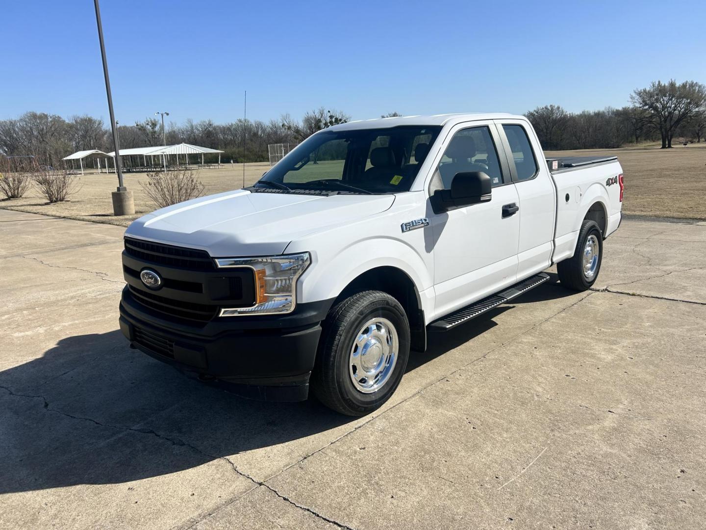 2018 White /Gray Ford F-150 EXTENDED CAB (1FTFX1E52JK) with an 5.0L V8 OHV 16V engine, 10 SPEED AUTOMATIC transmission, located at 17760 Hwy 62, Morris, OK, 74445, (918) 733-4887, 35.609104, -95.877060 - 2018 FORD F150 HAS A 5.0L V8 ENGINE AND IS 4WD. FEATURES KEYLESS ENTERY, LEATHER INTERIOR, POWER WINDOWS, POWER LOCKS, POWER MIRRORS, AM/FM RADIO, A/C, TRACTION CONTROL, AUXILIARY PORT, BACKUP CAMERA, TILT STEERING WHEEL, BED COVER, AND BED LINER. EQUIPPED WITH A BI-FUEL CNG FUEL SYSTEM. IT RUNS ON - Photo#0