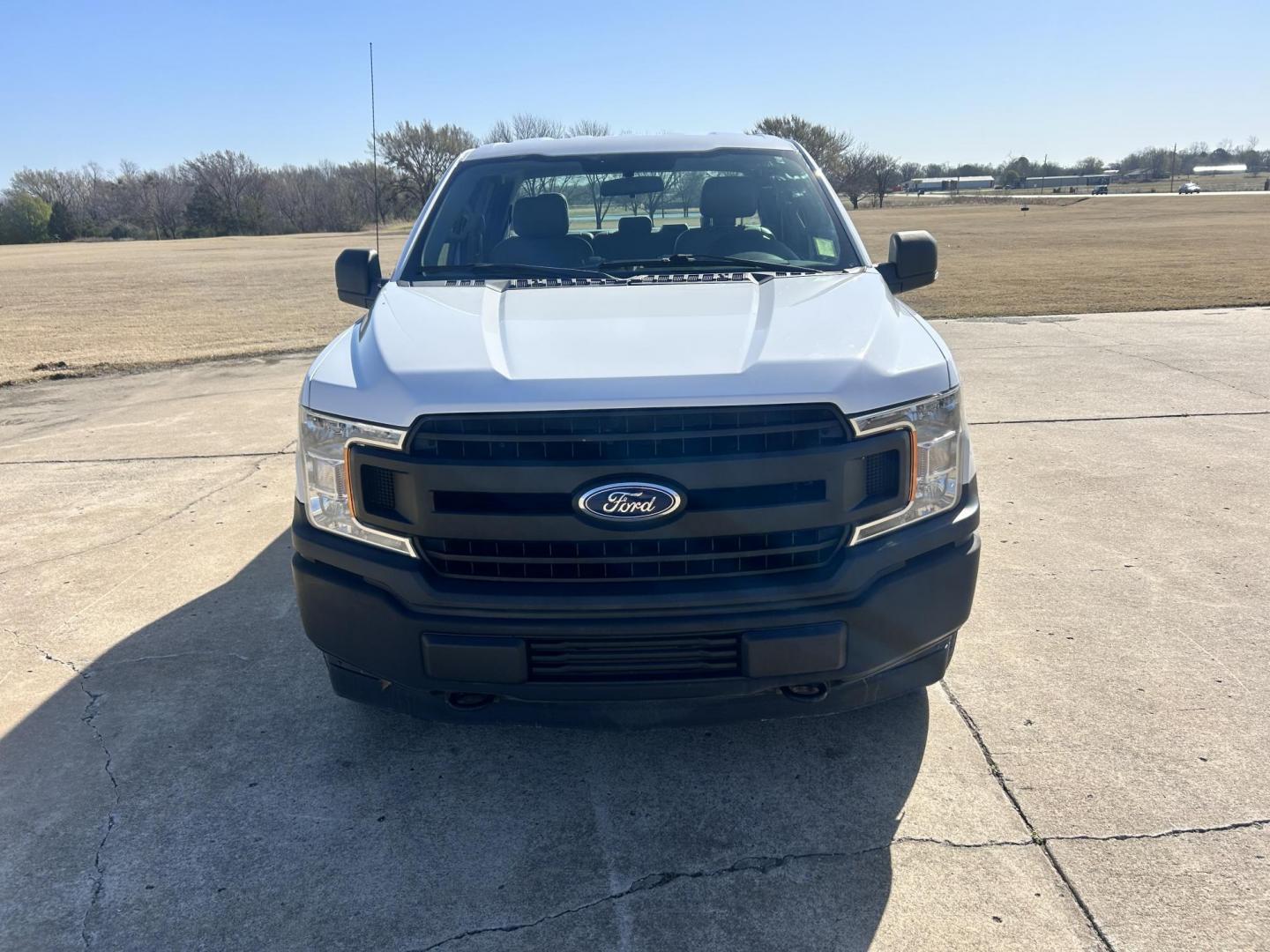 2018 White /Gray Ford F-150 EXTENDED CAB (1FTFX1E52JK) with an 5.0L V8 OHV 16V engine, 10 SPEED AUTOMATIC transmission, located at 17760 Hwy 62, Morris, OK, 74445, (918) 733-4887, 35.609104, -95.877060 - 2018 FORD F150 HAS A 5.0L V8 ENGINE AND IS 4WD. FEATURES KEYLESS ENTERY, LEATHER INTERIOR, POWER WINDOWS, POWER LOCKS, POWER MIRRORS, AM/FM RADIO, A/C, TRACTION CONTROL, AUXILIARY PORT, BACKUP CAMERA, TILT STEERING WHEEL, BED COVER, AND BED LINER. EQUIPPED WITH A BI-FUEL CNG FUEL SYSTEM. IT RUNS ON - Photo#1