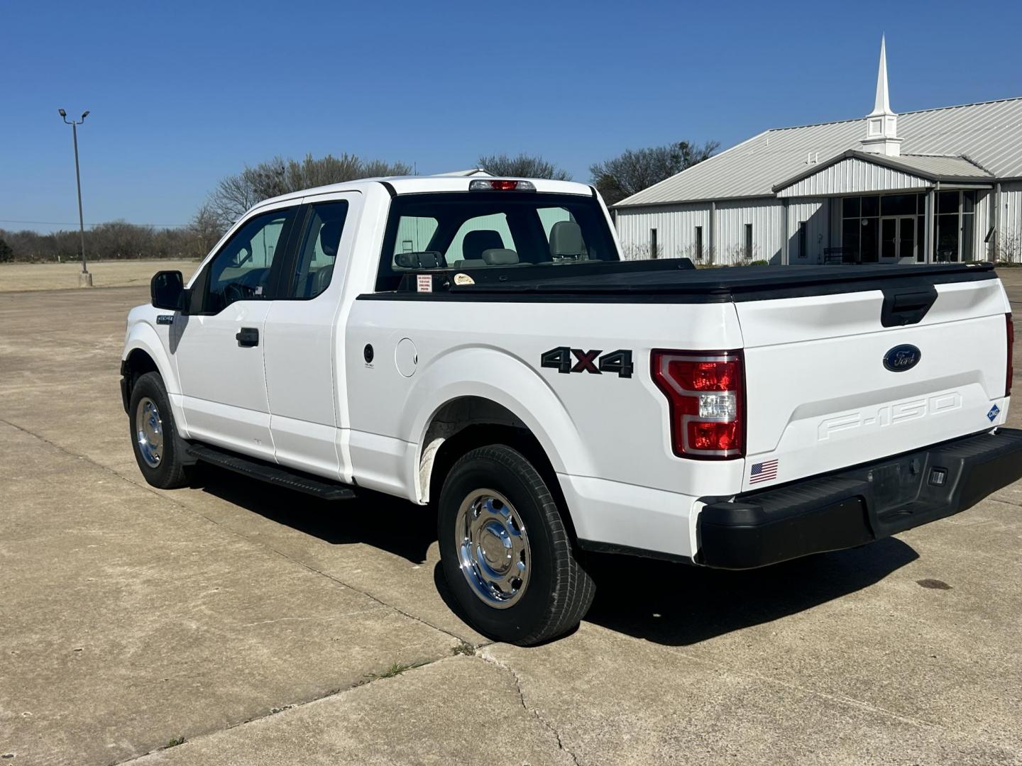 2018 White /Gray Ford F-150 EXTENDED CAB (1FTFX1E52JK) with an 5.0L V8 OHV 16V engine, 10 SPEED AUTOMATIC transmission, located at 17760 Hwy 62, Morris, OK, 74445, (918) 733-4887, 35.609104, -95.877060 - 2018 FORD F150 HAS A 5.0L V8 ENGINE AND IS 4WD. FEATURES KEYLESS ENTERY, LEATHER INTERIOR, POWER WINDOWS, POWER LOCKS, POWER MIRRORS, AM/FM RADIO, A/C, TRACTION CONTROL, AUXILIARY PORT, BACKUP CAMERA, TILT STEERING WHEEL, BED COVER, AND BED LINER. EQUIPPED WITH A BI-FUEL CNG FUEL SYSTEM. IT RUNS ON - Photo#6