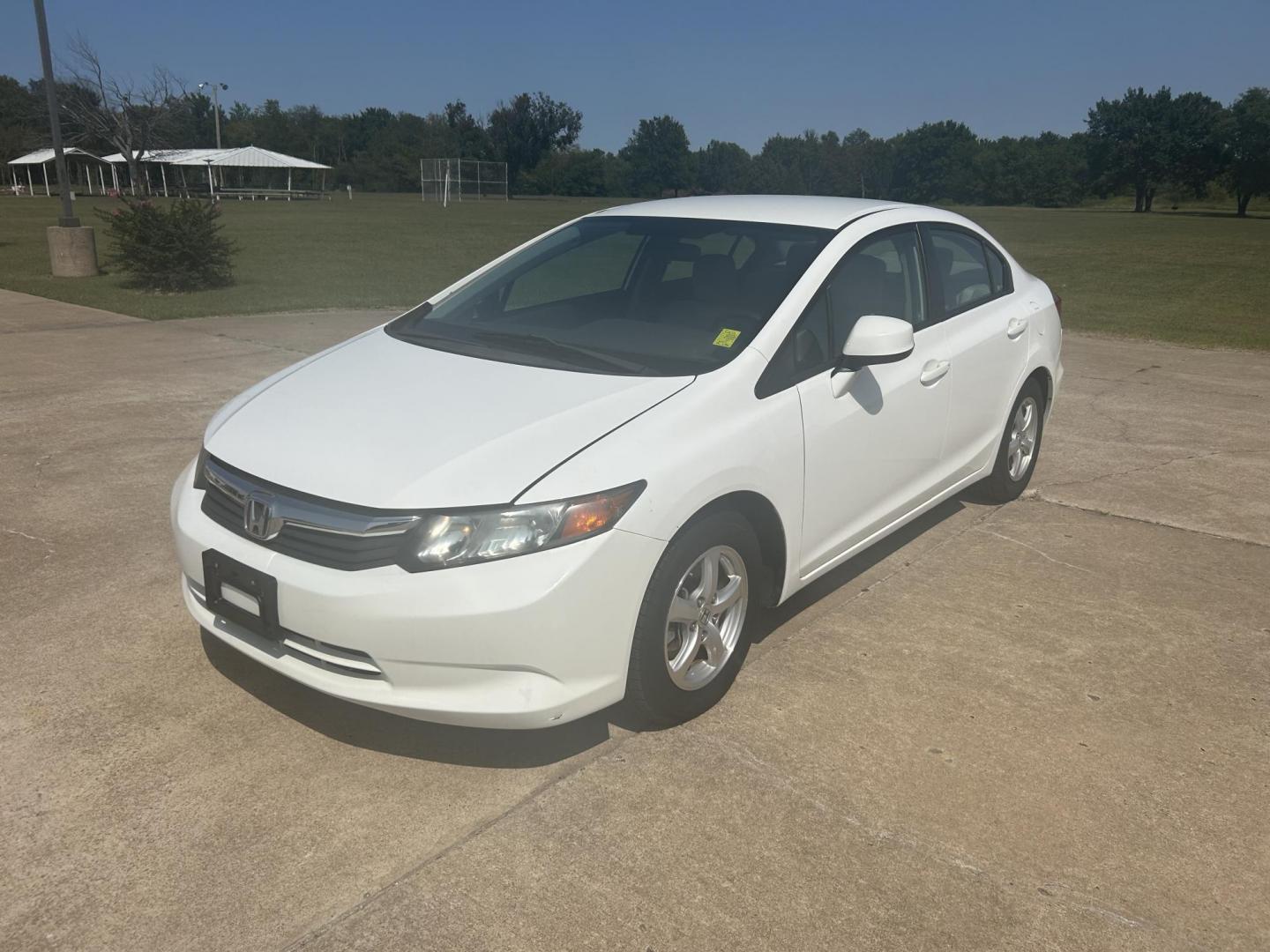 2012 White /Gray Honda Civic CNG Sedan 5-Speed AT (19XFB5F53CE) with an 1.8L L4 SOHC 16V CNG engine, 5-Speed Automatic transmission, located at 17760 Hwy 62, Morris, OK, 74445, (918) 733-4887, 35.609104, -95.877060 - Photo#0