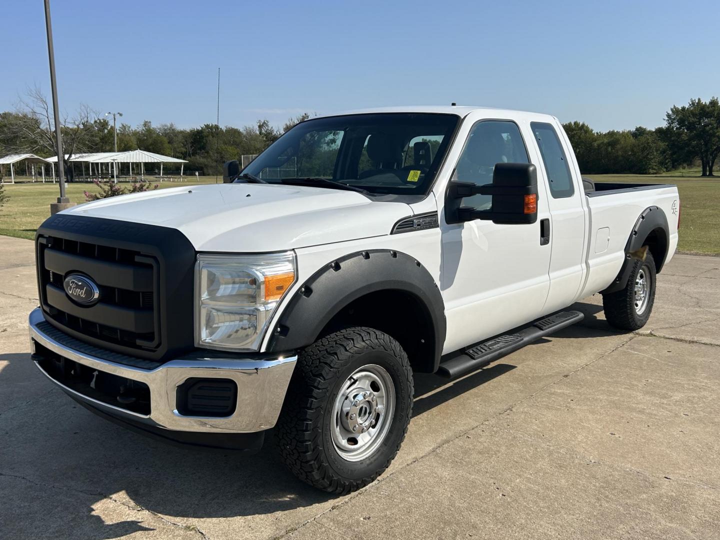 2014 White /Gray Ford F-250 SD XLT SuperCab Long Bed 4WD (1FT7X2B6XEE) with an 6.2L V8 OHV 16V engine, 6-Speed Automatic transmission, located at 17760 Hwy 62, Morris, OK, 74445, (918) 733-4887, 35.609104, -95.877060 - 2014 F250 SUPER DUTY IS A BI-FUEL SYSTEM THAT RUNS ON CNG OR GASOLINE. THIS TRUCK HAS A 6.2L V8 ENGINE AND IS 4WD. FEATURES MANUAL SEAT, POWER WINDOWS, POWER LOCKS, POWER MIRRORS, AM FM RADIO, TRACTION CONTROL, CRUISE CONTROL AND TRAILER HITCH. A PREMIER ALTERNATIVE FUEL CONVERSION THAT IS EPA APPRO - Photo#0