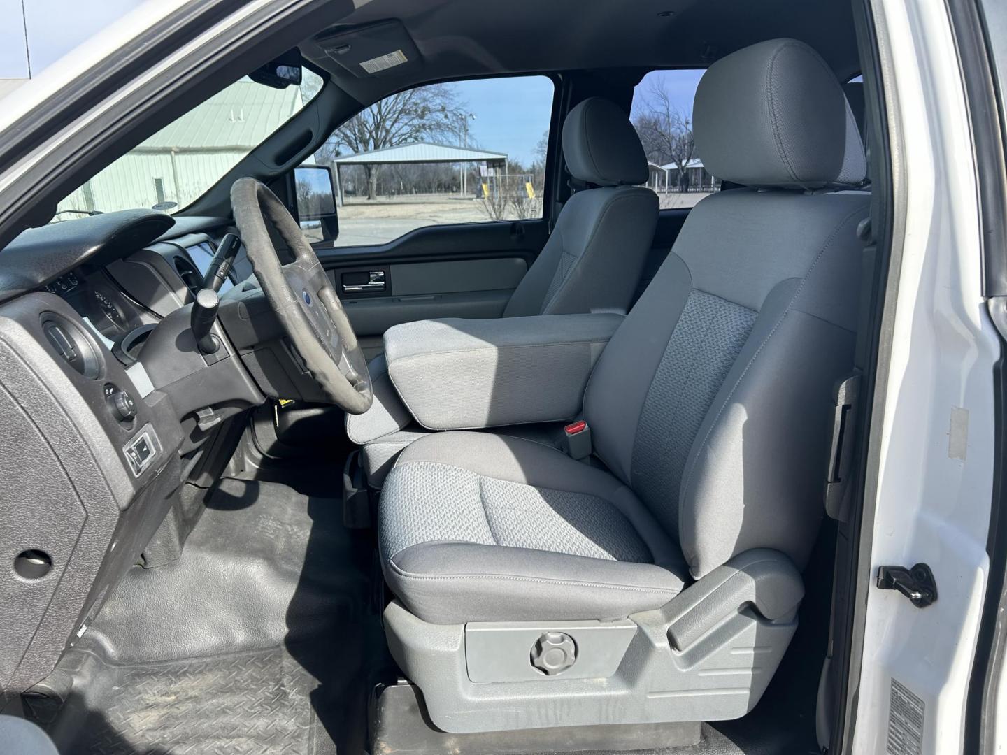 2012 White /Gray Ford F-150 XL SuperCab Bed 4WD (1FTVX1EF3CK) with an 5.0L V8 OHV 16V engine, 6-Speed Automatic transmission, located at 17760 Hwy 62, Morris, OK, 74445, (918) 733-4887, 35.609104, -95.877060 - 2012 FORD F-150 BI-FUEL SYSTEM RUNS ON CNG OR GASOLINE HAS THE 5.0L V8 AND IS 4WD. FEATURES POWER LOCKS, POWER WINDOWS, POWER MIRRORS, TOUCH SCREEN AM/FM STEREO, BLUETOOTH STEREO, CLOTH INTERIOR, BED LINER, CRUISE CONTROL, TRACTION CONTROL, TRAILER BRAKES, MULTI-FUNCTION STEERING CONTROL. A PREMIER - Photo#8