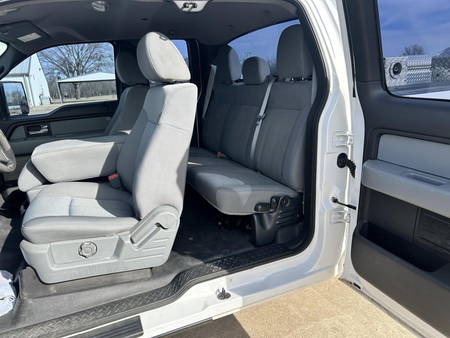 2012 White /Gray Ford F-150 XL SuperCab Bed 4WD (1FTVX1EF3CK) with an 5.0L V8 OHV 16V engine, 6-Speed Automatic transmission, located at 17760 Hwy 62, Morris, OK, 74445, (918) 733-4887, 35.609104, -95.877060 - 2012 FORD F-150 BI-FUEL SYSTEM RUNS ON CNG OR GASOLINE HAS THE 5.0L V8 AND IS 4WD. FEATURES POWER LOCKS, POWER WINDOWS, POWER MIRRORS, TOUCH SCREEN AM/FM STEREO, BLUETOOTH STEREO, CLOTH INTERIOR, BED LINER, CRUISE CONTROL, TRACTION CONTROL, TRAILER BRAKES, MULTI-FUNCTION STEERING CONTROL. A PREMIER - Photo#17