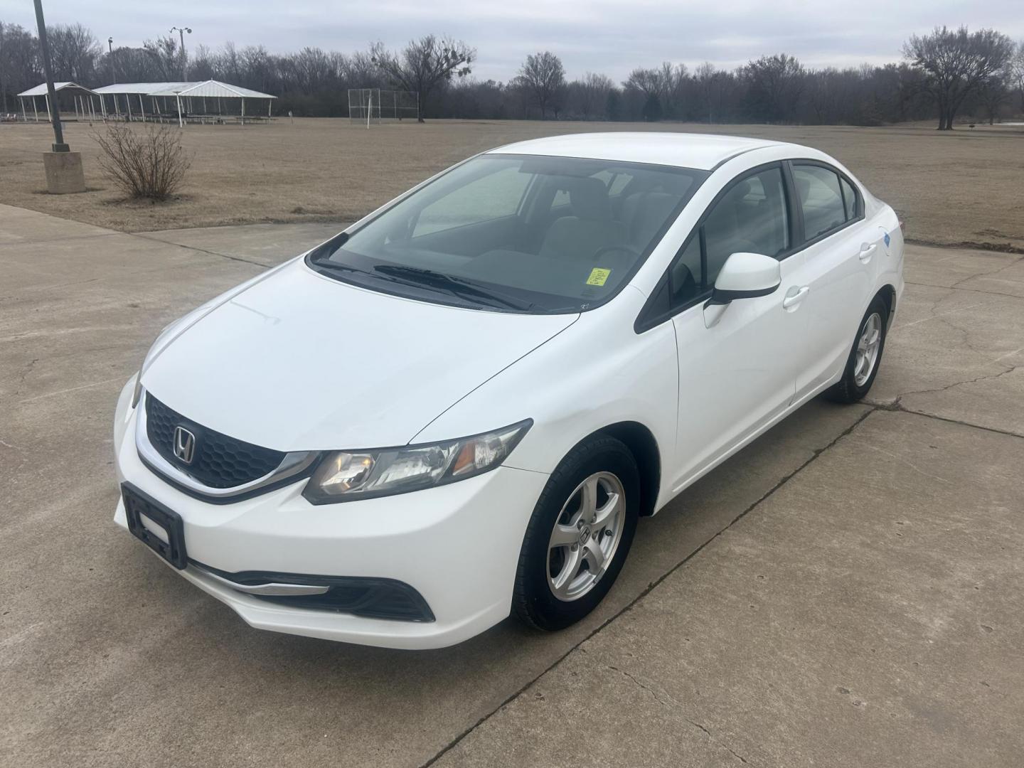 2013 White /TAN Honda Civic CNG Sedan 5-Speed AT (19XFB5F56DE) with an 1.8L L4 SOHC 16V CNG engine, 5A transmission, located at 17760 Hwy 62, Morris, OK, 74445, (918) 733-4887, 35.609104, -95.877060 - 2013 HONDA CIVIC DEDICATED CNG (RUNS ONLY ON COMPRESSED NATURAL GAS) HAS A 1.8L 4 CYLINDER ENGINE AND IS 2WD. FEATURES MANUAL SEATS, POWER LOCKS, POWER MIRRORS, POWER WINDOWS. HAS AM/FM RADIO, CD PLAYER, AUX PORT, USB PORT, CRUISE CONTROL, MULTI-FUNCTION STEERING WHEEL CONTROL, HANDS FREE CALLING, T - Photo#0