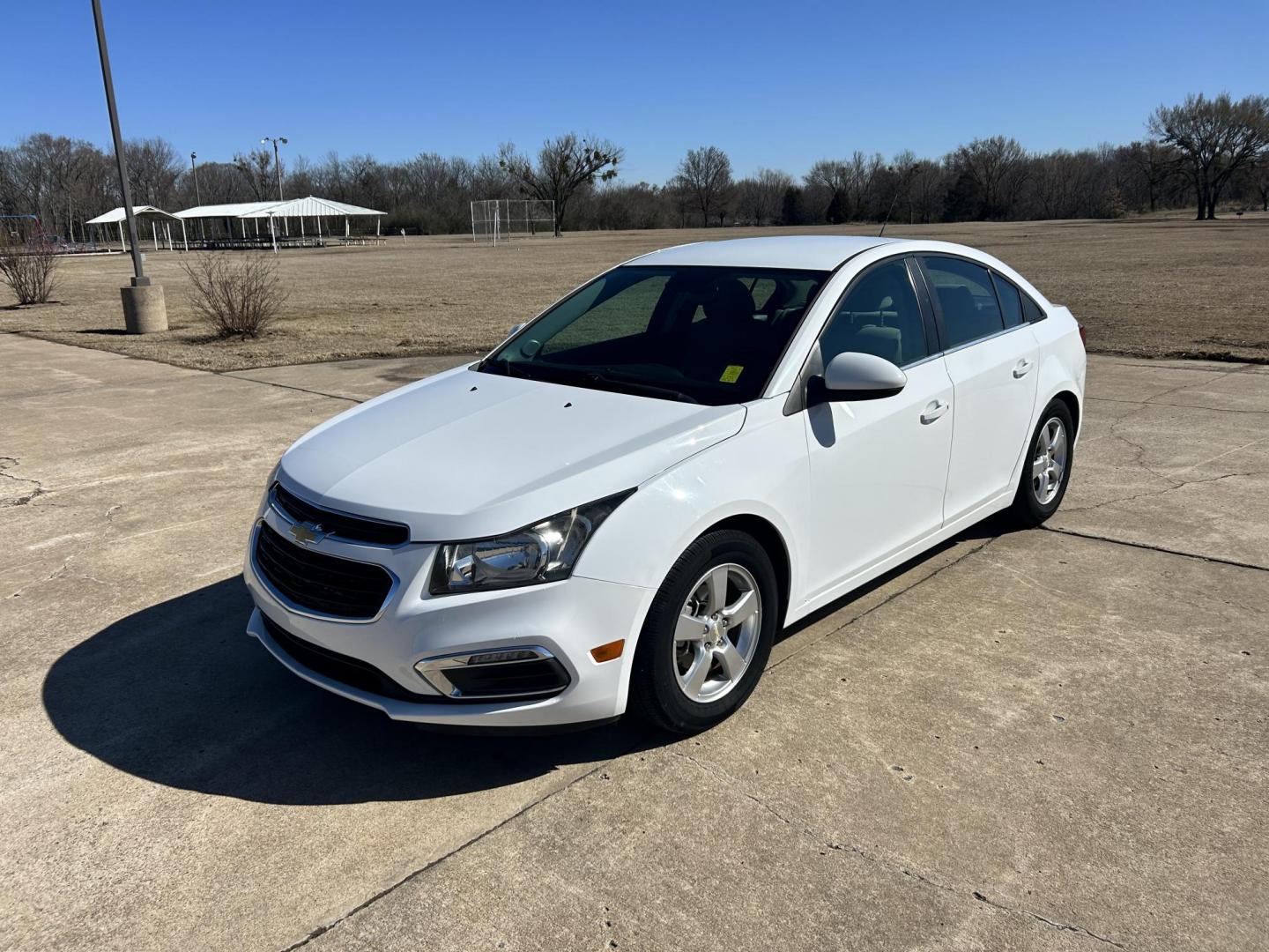 2015 White /Gray Chevrolet Cruze 1LT Auto (1G1PC5SB9F7) with an 1.4L L4 DOHC 16V TURBO engine, 6-Speed Automatic transmission, located at 17760 Hwy 62, Morris, OK, 74445, (918) 733-4887, 35.609104, -95.877060 - 2015 CHEVROLET CRUZE 1.4L L4 DOHC 16V TURBO FFV FWD, A BI-FUEL SYSTEM THAT RUNS ON CNG (COMPRESSED NATURAL GAS) OR GASOLINE. GREAT FOR YOUR EVERYDAY COMMUTE 42 MPG!!!!! THE CHEVROLET CRUZE FEATURES POWER LOCKS, POWER WINDOWS, POWER MIRRORS, MANUAL SEATS, CLOTH SEATS, AM/FM RADIO, CD PLAYER, ON STAR - Photo#1