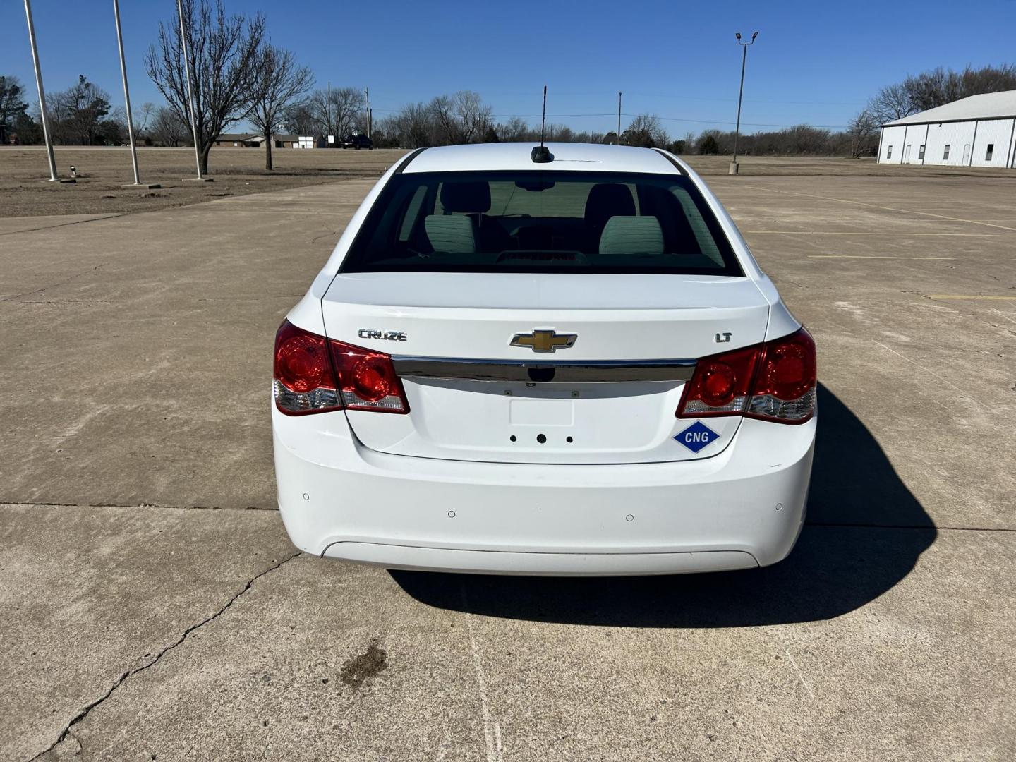 2015 White /Gray Chevrolet Cruze 1LT Auto (1G1PC5SB9F7) with an 1.4L L4 DOHC 16V TURBO engine, 6-Speed Automatic transmission, located at 17760 Hwy 62, Morris, OK, 74445, (918) 733-4887, 35.609104, -95.877060 - 2015 CHEVROLET CRUZE 1.4L L4 DOHC 16V TURBO FFV FWD, A BI-FUEL SYSTEM THAT RUNS ON CNG (COMPRESSED NATURAL GAS) OR GASOLINE. GREAT FOR YOUR EVERYDAY COMMUTE 42 MPG!!!!! THE CHEVROLET CRUZE FEATURES POWER LOCKS, POWER WINDOWS, POWER MIRRORS, MANUAL SEATS, CLOTH SEATS, AM/FM RADIO, CD PLAYER, ON STAR - Photo#5