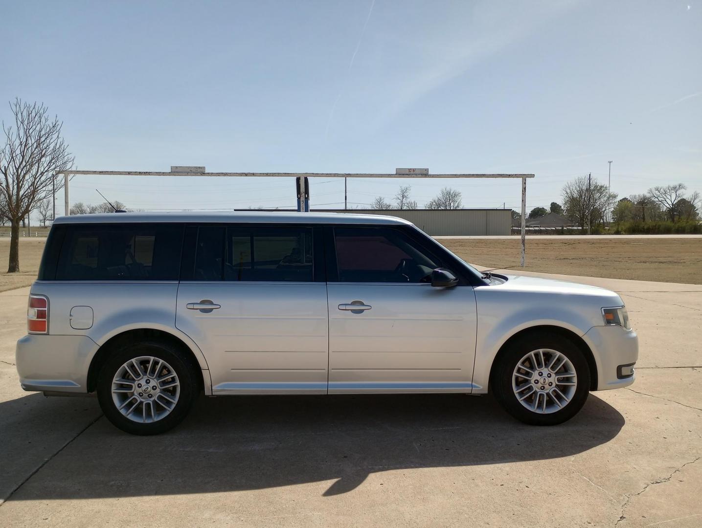 2014 Silver /BLACK Ford Flex SEL FWD (2FMGK5C87EB) with an 3.5L V6 DOHC 24V engine, 6-Speed Automatic Overdrive transmission, located at 17760 Hwy 62, Morris, OK, 74445, (918) 733-4887, 35.609104, -95.877060 - 2014 FORD FLEX 3.5L V6 DOHC 24V FEATURES POWER LOCKS, POWER WINDOWS, POWER MIRRORS, DUAL CLIMATE CONTROL, REAR CLIMATE CONTROL, LEATHER SEATS, CRUISE CONTROL, MULTI-FUNCTION STEERING WHEEL CONTROL, NAVIGATION SYSTEM, AM/FM STEREO, XM STEREO, CD PLAYER, BLUETOOTH, TOUCHSCREEN RADIO, BACK-UP CAMERA, 3 - Photo#1