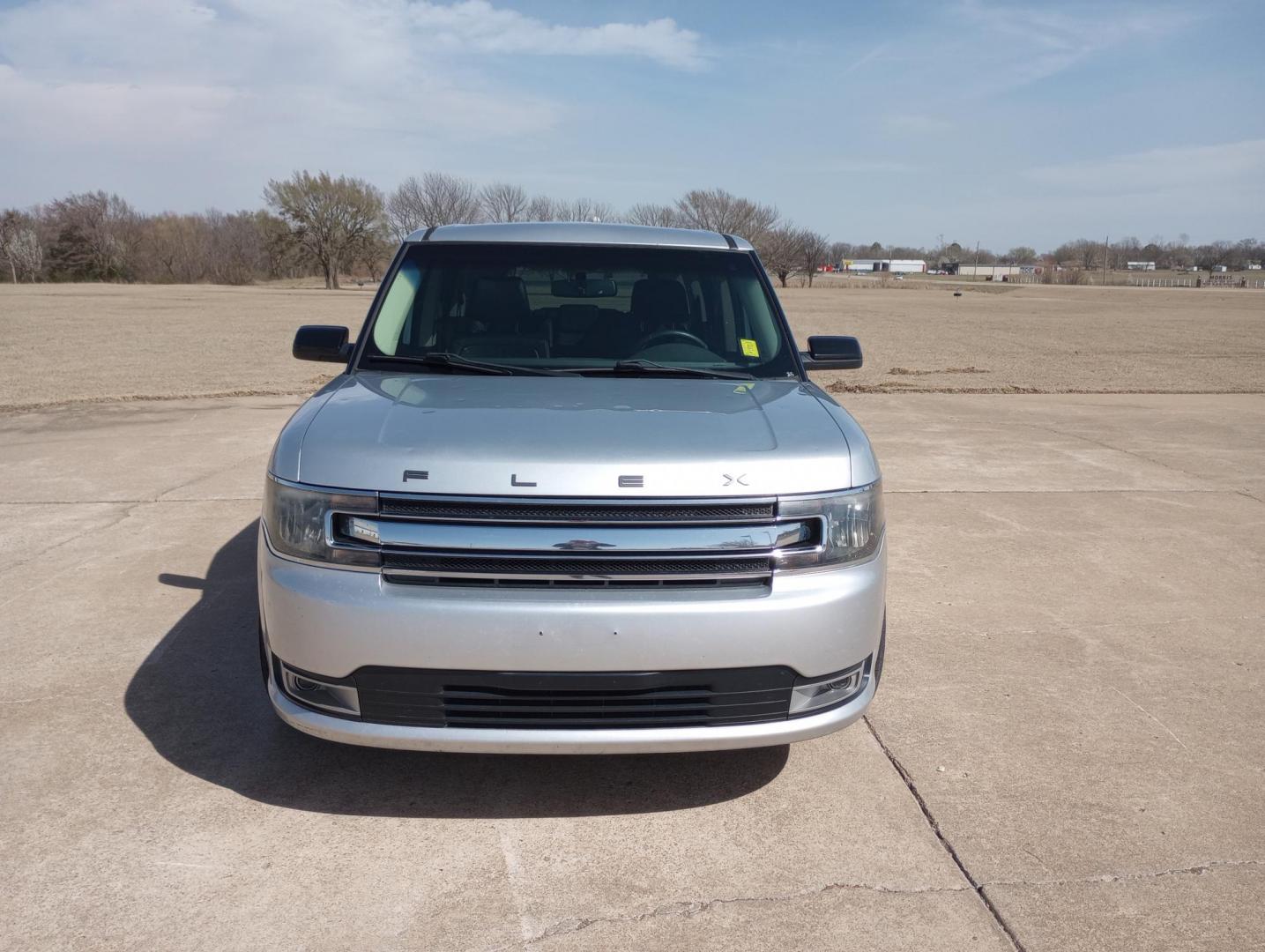 2014 Silver /BLACK Ford Flex SEL FWD (2FMGK5C87EB) with an 3.5L V6 DOHC 24V engine, 6-Speed Automatic Overdrive transmission, located at 17760 Hwy 62, Morris, OK, 74445, (918) 733-4887, 35.609104, -95.877060 - 2014 FORD FLEX 3.5L V6 DOHC 24V FEATURES POWER LOCKS, POWER WINDOWS, POWER MIRRORS, DUAL CLIMATE CONTROL, REAR CLIMATE CONTROL, LEATHER SEATS, CRUISE CONTROL, MULTI-FUNCTION STEERING WHEEL CONTROL, NAVIGATION SYSTEM, AM/FM STEREO, XM STEREO, CD PLAYER, BLUETOOTH, TOUCHSCREEN RADIO, BACK-UP CAMERA, 3 - Photo#7