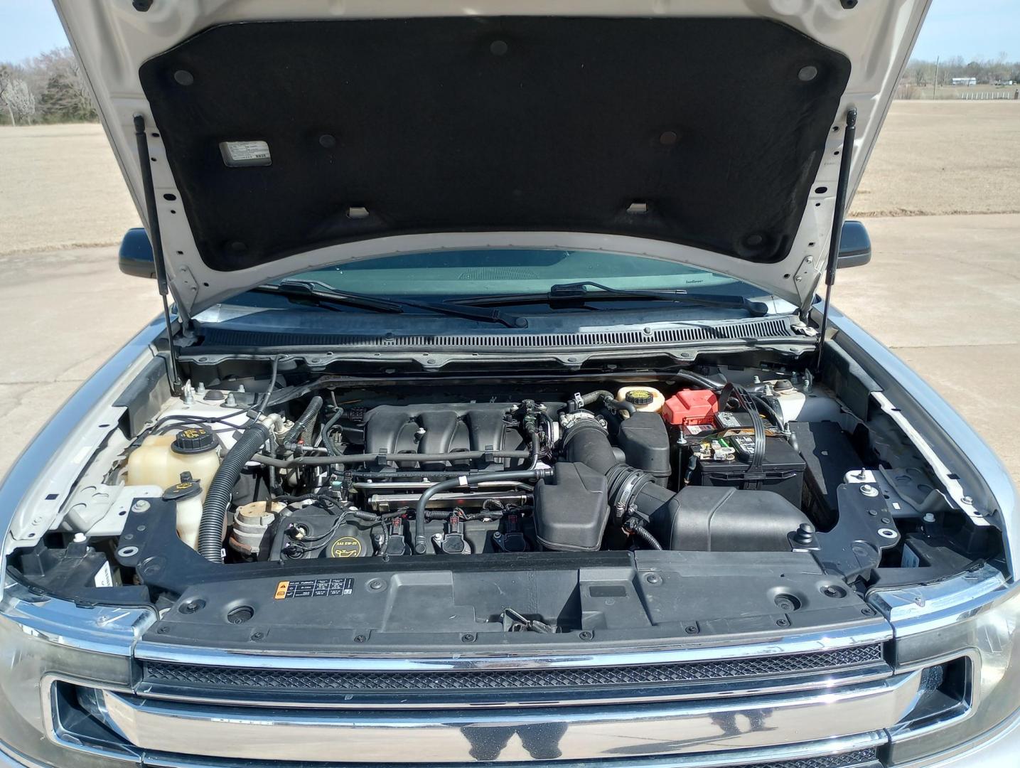 2014 Silver /BLACK Ford Flex SEL FWD (2FMGK5C87EB) with an 3.5L V6 DOHC 24V engine, 6-Speed Automatic Overdrive transmission, located at 17760 Hwy 62, Morris, OK, 74445, (918) 733-4887, 35.609104, -95.877060 - 2014 FORD FLEX 3.5L V6 DOHC 24V FEATURES POWER LOCKS, POWER WINDOWS, POWER MIRRORS, DUAL CLIMATE CONTROL, REAR CLIMATE CONTROL, LEATHER SEATS, CRUISE CONTROL, MULTI-FUNCTION STEERING WHEEL CONTROL, NAVIGATION SYSTEM, AM/FM STEREO, XM STEREO, CD PLAYER, BLUETOOTH, TOUCHSCREEN RADIO, BACK-UP CAMERA, 3 - Photo#12