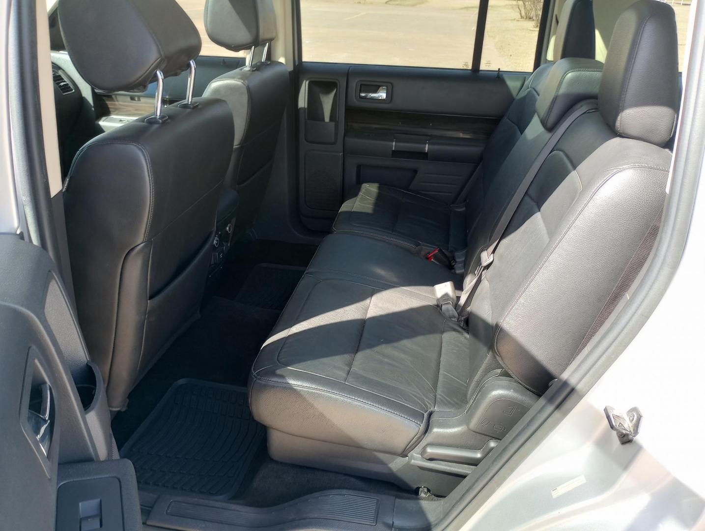 2014 Silver /BLACK Ford Flex SEL FWD (2FMGK5C87EB) with an 3.5L V6 DOHC 24V engine, 6-Speed Automatic Overdrive transmission, located at 17760 Hwy 62, Morris, OK, 74445, (918) 733-4887, 35.609104, -95.877060 - 2014 FORD FLEX 3.5L V6 DOHC 24V FEATURES POWER LOCKS, POWER WINDOWS, POWER MIRRORS, DUAL CLIMATE CONTROL, REAR CLIMATE CONTROL, LEATHER SEATS, CRUISE CONTROL, MULTI-FUNCTION STEERING WHEEL CONTROL, NAVIGATION SYSTEM, AM/FM STEREO, XM STEREO, CD PLAYER, BLUETOOTH, TOUCHSCREEN RADIO, BACK-UP CAMERA, 3 - Photo#24