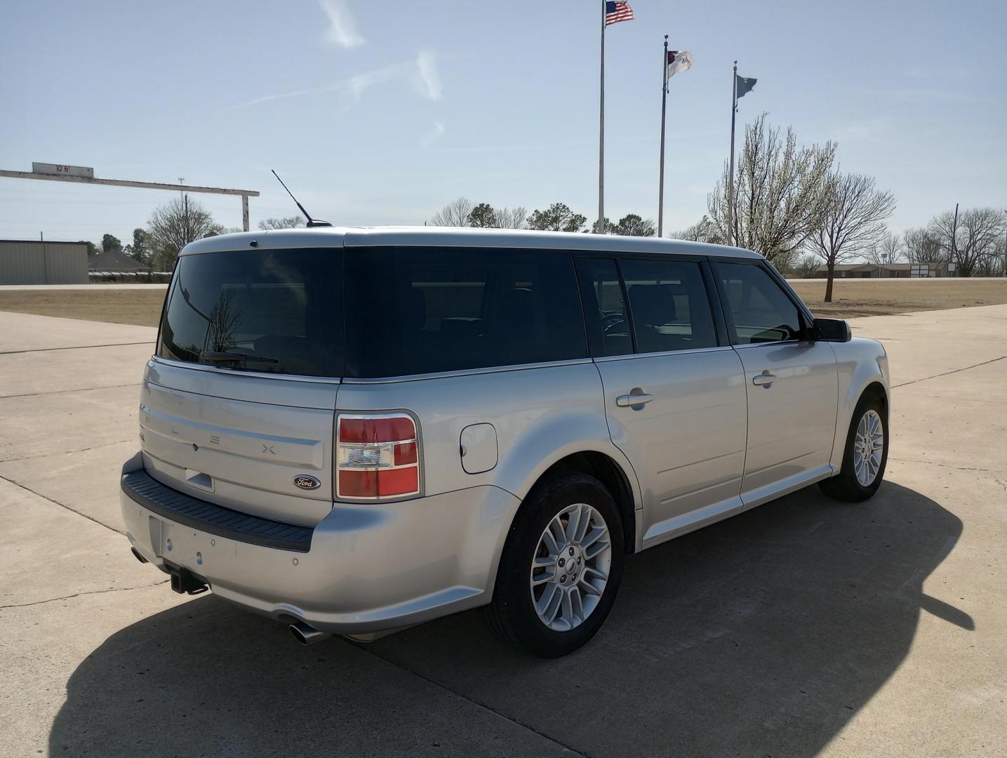 2014 Silver /BLACK Ford Flex SEL FWD (2FMGK5C87EB) with an 3.5L V6 DOHC 24V engine, 6-Speed Automatic Overdrive transmission, located at 17760 Hwy 62, Morris, OK, 74445, (918) 733-4887, 35.609104, -95.877060 - 2014 FORD FLEX 3.5L V6 DOHC 24V FEATURES POWER LOCKS, POWER WINDOWS, POWER MIRRORS, DUAL CLIMATE CONTROL, REAR CLIMATE CONTROL, LEATHER SEATS, CRUISE CONTROL, MULTI-FUNCTION STEERING WHEEL CONTROL, NAVIGATION SYSTEM, AM/FM STEREO, XM STEREO, CD PLAYER, BLUETOOTH, TOUCHSCREEN RADIO, BACK-UP CAMERA, 3 - Photo#2