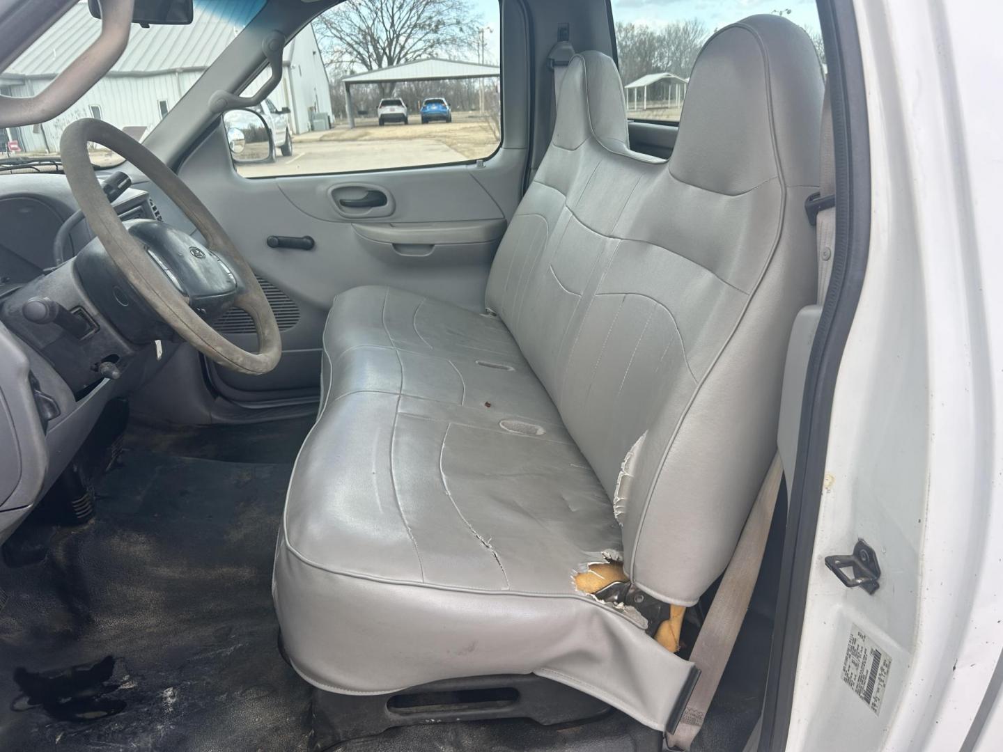 2000 White /Gray Ford F-150 (1FTPF17M4YK) with an 5.4L V8 SOHC 16V engine, located at 17760 Hwy 62, Morris, OK, 74445, (918) 733-4887, 35.609104, -95.877060 - 2000 FORD F150 2WD HAS THE 5.4L V8 SOHC 16V 5FT. BED DEDICATED CNG ONLY RUNS ON COMPRESSED NATURAL GAS AND DOES NOT RUN ON GASOLINE. FEATURES MANUAL WINDOWS, MANUAL LOCKS, MANUAL MIRRORS, LEATHER BENCH SEAT, CRUISE CONTROL, AM/FM RADIO, AC AND HEAT, GOODYEAR TIRES 245/75R16. ONLY 157,395 MILES. THI - Photo#8