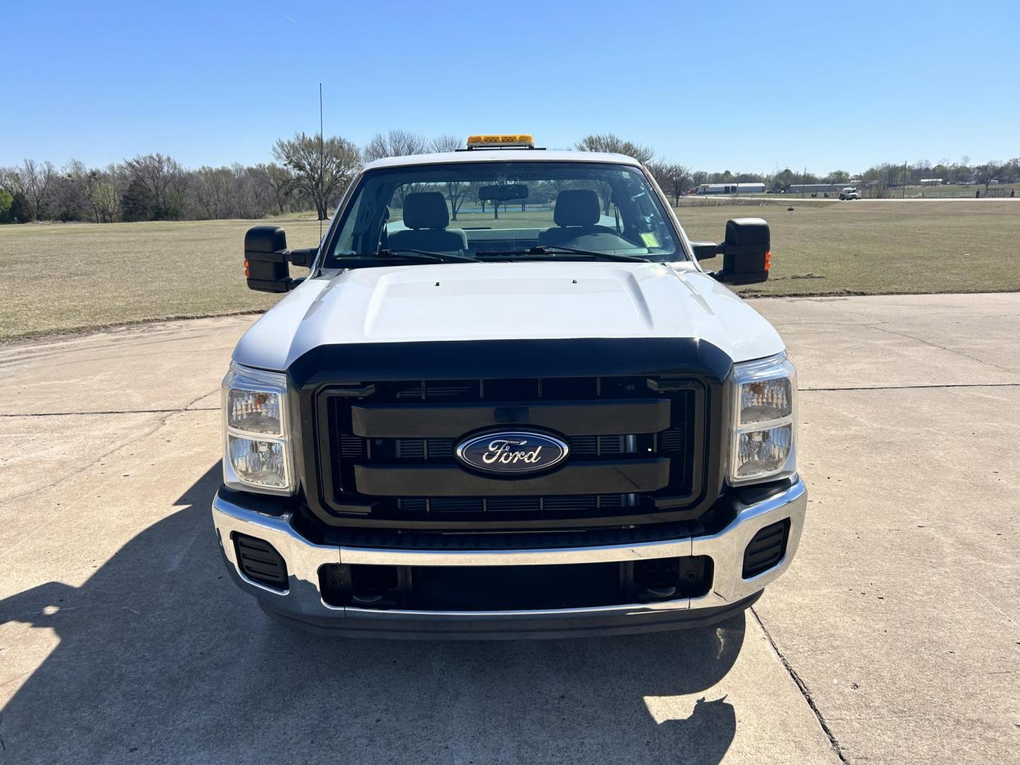 2016 White /Gray Ford F-250 SD 2WD (1FDBF2A62GE) with an 6.2L V8 OHV 16V engine, 6A transmission, located at 17760 Hwy 62, Morris, OK, 74445, (918) 733-4887, 35.609104, -95.877060 - 2016 FORD F250 TOOL BED SUPER DUTY IS A BI-FUEL SYSTEM THAT RUNS ON CNG OR GASOLINE. THIS TRUCK HAS A 6.2L V8 ENGINE, FEATURES MANUAL SEAT, LEATHER INTERIOR, POWER WINDOWS, POWER LOCKS, POWER MIRRORS, AM FM RADIO, AUXILLARY PORT, BACKUP CAMERA, TRACTION CONTROL, TOOL BED, AND TRAILER HITCH. A PREMIE - Photo#1