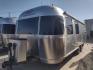 2007 Silver Airstream OCEAN BREEZE 25CCD 25CCD (1STCFYJ2X7J) , located at 17760 Hwy 62, Morris, OK, 74445, 35.609104, -95.877060 - CAMPING SEASON IS HERE GRAB IT WHILE YOU CAN!!! A 2007 AIRSTREAM INTERNATIONAL OCEAN BREEZE 25CCD OVERALL 26FT. IN THE FRONT IS THE LIVING/KITCHEN AREA THAT FEATURES A CLOTH COUCH WITH OVERHEAD CABINET, STORAGE UNDER THE COUCH, BOOTH STYLE DINETTE THAT FOLDS DOWN FOR ADDITIONAL SLEEPING, OVERHEAD C - Photo#0