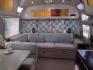 2007 Silver Airstream OCEAN BREEZE 25CCD 25CCD (1STCFYJ2X7J) , located at 17760 Hwy 62, Morris, OK, 74445, 35.609104, -95.877060 - CAMPING SEASON IS HERE GRAB IT WHILE YOU CAN!!! A 2007 AIRSTREAM INTERNATIONAL OCEAN BREEZE 25CCD OVERALL 26FT. IN THE FRONT IS THE LIVING/KITCHEN AREA THAT FEATURES A CLOTH COUCH WITH OVERHEAD CABINET, STORAGE UNDER THE COUCH, BOOTH STYLE DINETTE THAT FOLDS DOWN FOR ADDITIONAL SLEEPING, OVERHEAD C - Photo#9