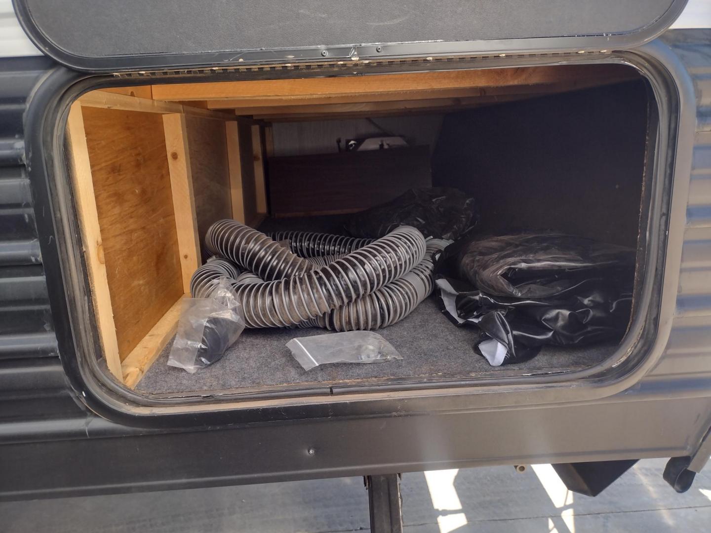 2020 Silver Forest River GREY WOLF PUP 22RR 22RR (4X4TCKX24LK) , located at 17760 Hwy 62, Morris, OK, 74445, 35.609104, -95.877060 - CAMPING SEASON IS HERE! CHECK OUT THIS 2020 FOREST RIVER GREY WOLF PUP TOY HAULER 22RR 29FT OVERALL WITH A 15FT POWER AWNING. IN THE LIVING/KITCHEN AREA IS A FARM STYLE SINK WITH OVERHEAD CABINETS, 3 BURNER STOVE WITH OVEN, OVERHEAD MICROWAVE, PANTRY, MID-SIZE FRIDGE, AM/FM RADIO, BOOTH STYLE DINETT - Photo#12