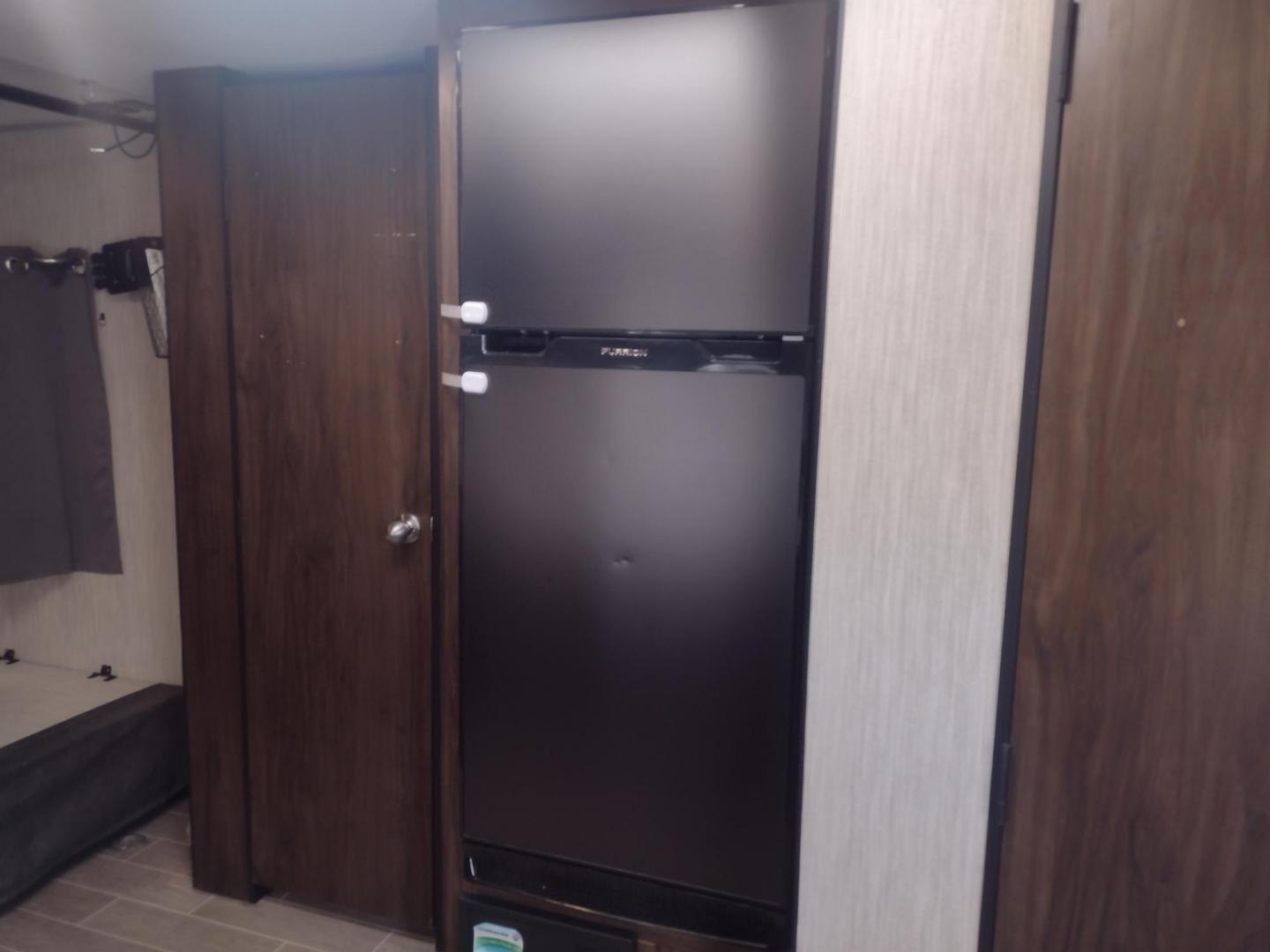 2020 Silver Forest River GREY WOLF PUP 22RR 22RR (4X4TCKX24LK) , located at 17760 Hwy 62, Morris, OK, 74445, 35.609104, -95.877060 - CAMPING SEASON IS HERE! CHECK OUT THIS 2020 FOREST RIVER GREY WOLF PUP TOY HAULER 22RR 29FT OVERALL WITH A 15FT POWER AWNING. IN THE LIVING/KITCHEN AREA IS A FARM STYLE SINK WITH OVERHEAD CABINETS, 3 BURNER STOVE WITH OVEN, OVERHEAD MICROWAVE, PANTRY, MID-SIZE FRIDGE, AM/FM RADIO, BOOTH STYLE DINETT - Photo#20