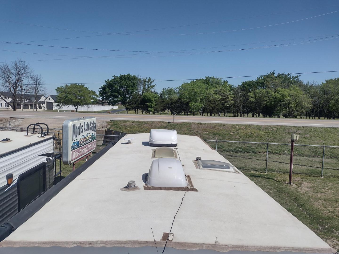 2020 Silver Forest River GREY WOLF PUP 22RR 22RR (4X4TCKX24LK) , located at 17760 Hwy 62, Morris, OK, 74445, 35.609104, -95.877060 - CAMPING SEASON IS HERE! CHECK OUT THIS 2020 FOREST RIVER GREY WOLF PUP TOY HAULER 22RR 29FT OVERALL WITH A 15FT POWER AWNING. IN THE LIVING/KITCHEN AREA IS A FARM STYLE SINK WITH OVERHEAD CABINETS, 3 BURNER STOVE WITH OVEN, OVERHEAD MICROWAVE, PANTRY, MID-SIZE FRIDGE, AM/FM RADIO, BOOTH STYLE DINETT - Photo#7