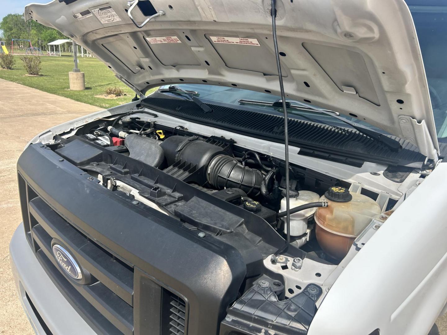 2009 White /Gray Ford E-Series Van E-250 (1FTNE24L49D) with an 5.4L V8 SOHC 16V engine, 4-Speed Automatic transmission, located at 17760 Hwy 62, Morris, OK, 74445, (918) 733-4887, 35.609104, -95.877060 - 2009 FORD E-SERIES VAN E-250 5.4 V8 DEDICATED CNG (COMPRESSED NATURAL GAS) DOES NOT RUN ON GASOLINE. FEATURES MANUAL SEATS, MANUAL LOCKS, MANUAL WINDOWS, MANUAL MIRRORS, AM/FM RADIO, AND WORK SHELF IN THE REAR. IT IS EQUIPPED WITH A CNG FUELING SYSTEM, IT RUNS ON COMPRESSED NATURAL GAS. A PREMIER AL - Photo#17