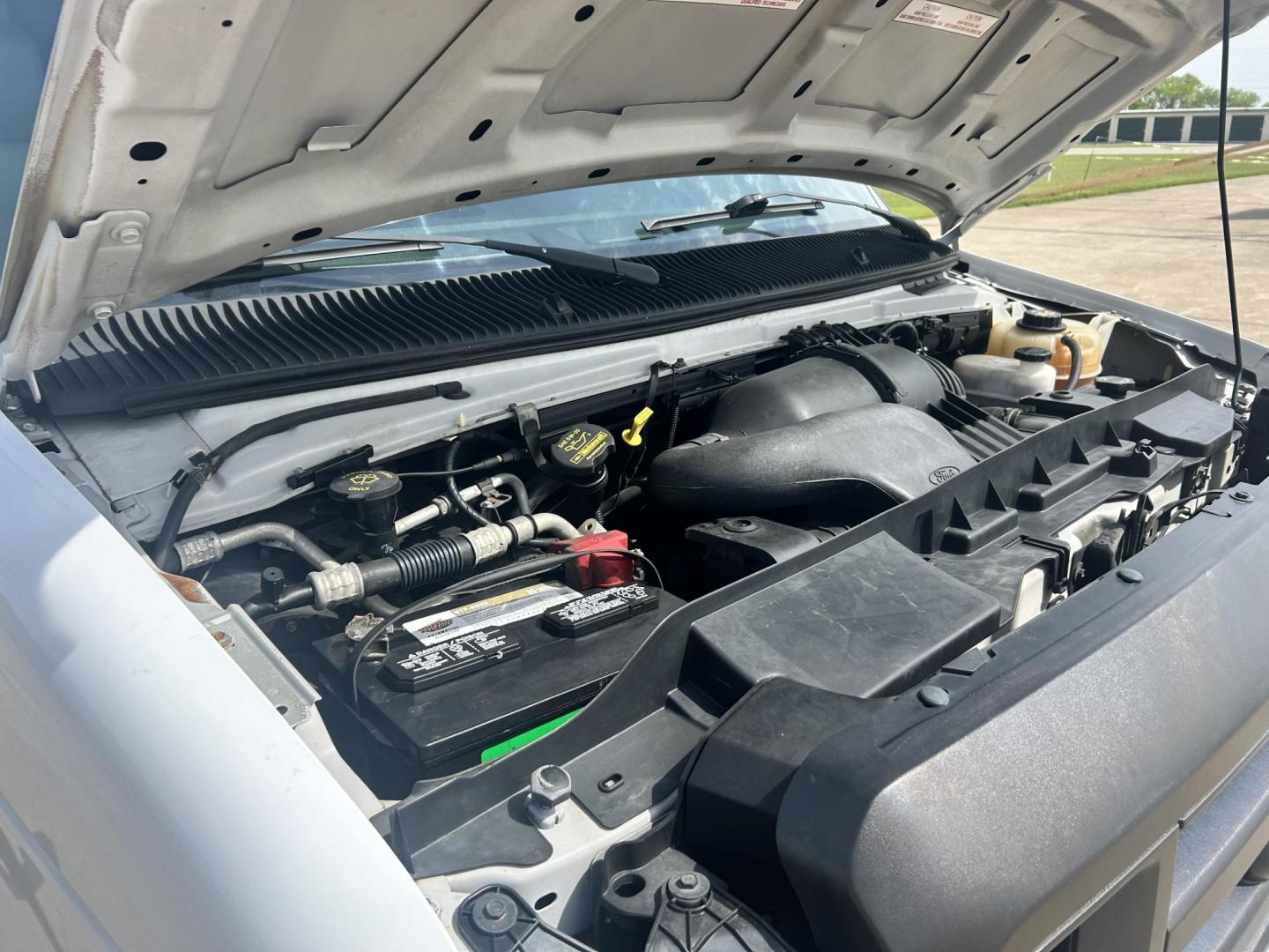 2009 White /Gray Ford E-Series Van E-250 (1FTNE24L49D) with an 5.4L V8 SOHC 16V engine, 4-Speed Automatic transmission, located at 17760 Hwy 62, Morris, OK, 74445, (918) 733-4887, 35.609104, -95.877060 - 2009 FORD E-SERIES VAN E-250 5.4 V8 DEDICATED CNG (COMPRESSED NATURAL GAS) DOES NOT RUN ON GASOLINE. FEATURES MANUAL SEATS, MANUAL LOCKS, MANUAL WINDOWS, MANUAL MIRRORS, AM/FM RADIO, AND WORK SHELF IN THE REAR. IT IS EQUIPPED WITH A CNG FUELING SYSTEM, IT RUNS ON COMPRESSED NATURAL GAS. A PREMIER AL - Photo#18