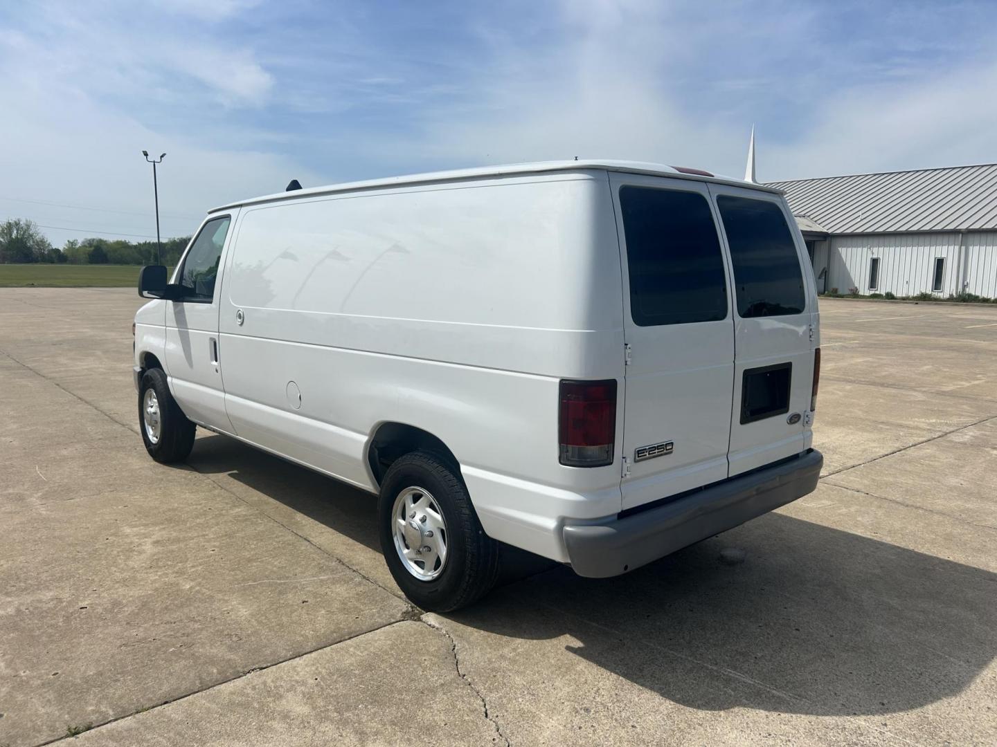 2009 White /Gray Ford E-Series Van E-250 (1FTNE24L49D) with an 5.4L V8 SOHC 16V engine, 4-Speed Automatic transmission, located at 17760 Hwy 62, Morris, OK, 74445, (918) 733-4887, 35.609104, -95.877060 - 2009 FORD E-SERIES VAN E-250 5.4 V8 DEDICATED CNG (COMPRESSED NATURAL GAS) DOES NOT RUN ON GASOLINE. FEATURES MANUAL SEATS, MANUAL LOCKS, MANUAL WINDOWS, MANUAL MIRRORS, AM/FM RADIO, AND WORK SHELF IN THE REAR. IT IS EQUIPPED WITH A CNG FUELING SYSTEM, IT RUNS ON COMPRESSED NATURAL GAS. A PREMIER AL - Photo#7