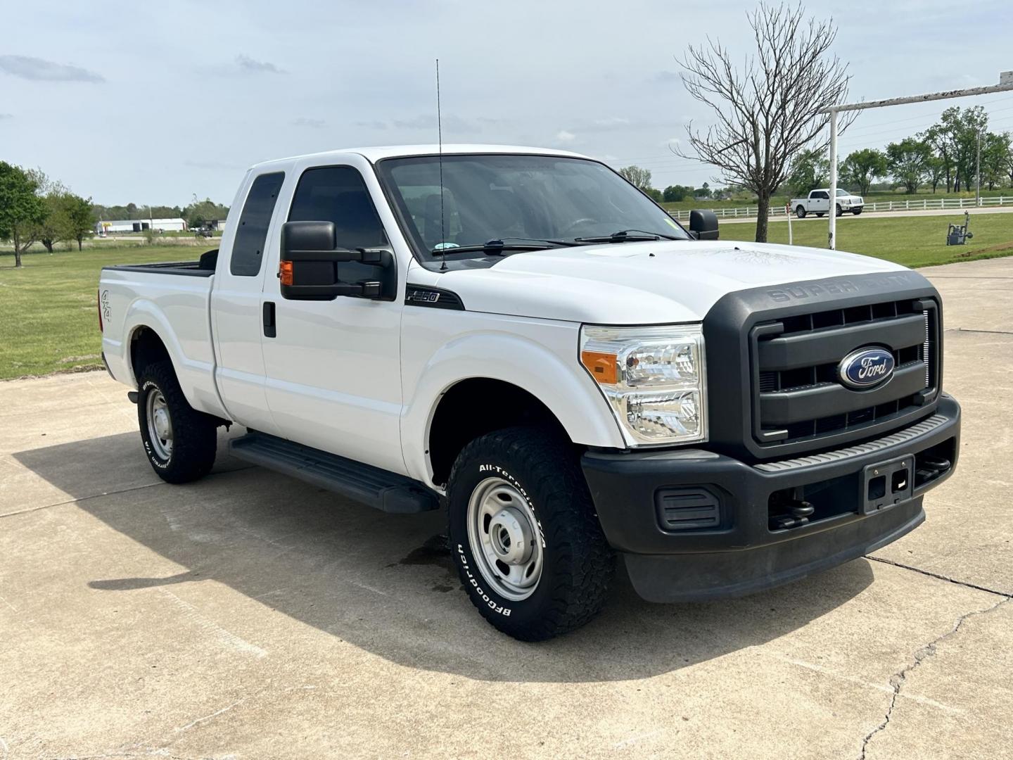 2014 White /Gray Ford F-250 SD XLT SuperCab Long Bed 4WD (1FT7X2B67EE) with an 6.2L V8 OHV 16V engine, 6-Speed Automatic transmission, located at 17760 Hwy 62, Morris, OK, 74445, (918) 733-4887, 35.609104, -95.877060 - 2014 F250 SUPER DUTY 4WD IS A BI-FUEL SYSTEM THAT RUNS ON CNG OR GASOLINE. THIS TRUCK HAS A 6.2L V8 ENGINE, FEATURES MANUAL SEAT, POWER WINDOWS, POWER LOCKS, POWER MIRRORS, AM FM RADIO, TRACTION CONTROL, CRUISE CONTROL, BED LINER AND TRAILER HITCH. A PREMIER ALTERNATIVE FUEL CONVERSION THAT IS EPA - Photo#1