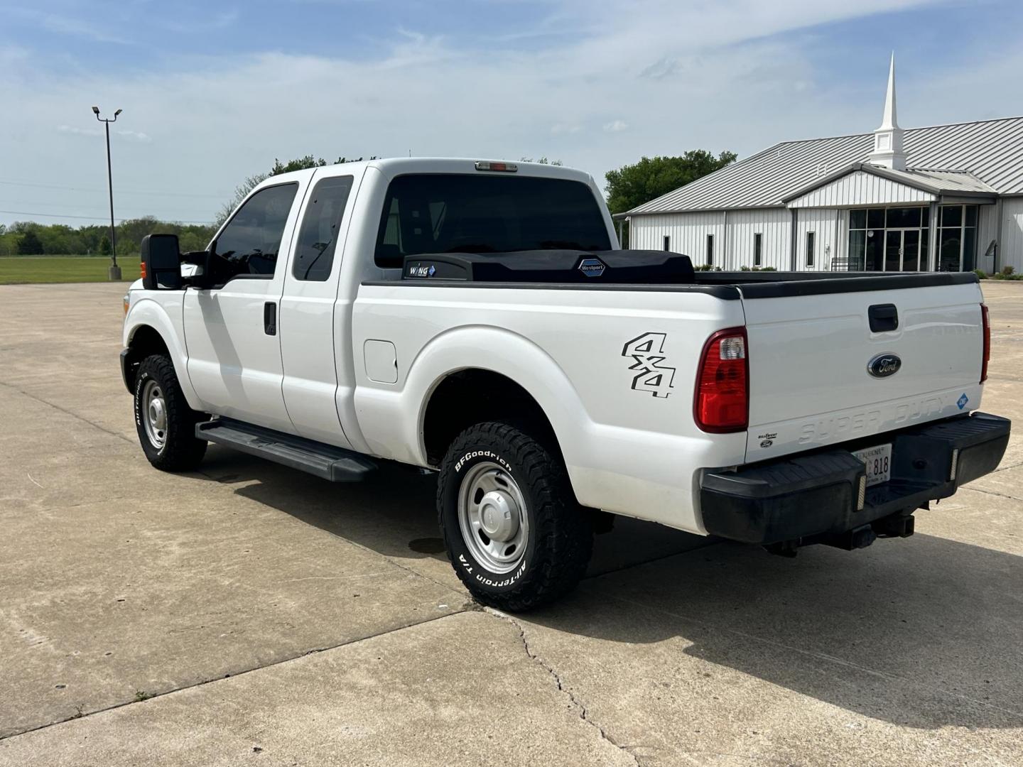 2014 White /Gray Ford F-250 SD XLT SuperCab Long Bed 4WD (1FT7X2B67EE) with an 6.2L V8 OHV 16V engine, 6-Speed Automatic transmission, located at 17760 Hwy 62, Morris, OK, 74445, (918) 733-4887, 35.609104, -95.877060 - 2014 F250 SUPER DUTY 4WD IS A BI-FUEL SYSTEM THAT RUNS ON CNG OR GASOLINE. THIS TRUCK HAS A 6.2L V8 ENGINE, FEATURES MANUAL SEAT, POWER WINDOWS, POWER LOCKS, POWER MIRRORS, AM FM RADIO, TRACTION CONTROL, CRUISE CONTROL, BED LINER AND TRAILER HITCH. A PREMIER ALTERNATIVE FUEL CONVERSION THAT IS EPA - Photo#6