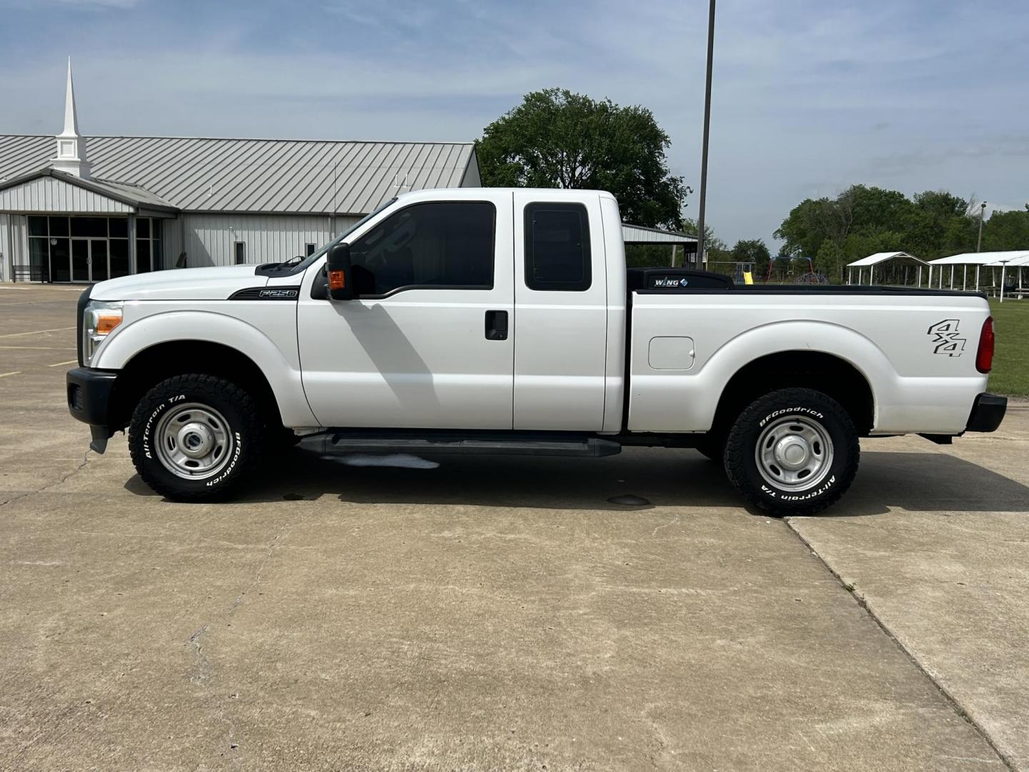2014 White /Gray Ford F-250 SD XLT SuperCab Long Bed 4WD (1FT7X2B67EE) with an 6.2L V8 OHV 16V engine, 6-Speed Automatic transmission, located at 17760 Hwy 62, Morris, OK, 74445, (918) 733-4887, 35.609104, -95.877060 - 2014 F250 SUPER DUTY 4WD IS A BI-FUEL SYSTEM THAT RUNS ON CNG OR GASOLINE. THIS TRUCK HAS A 6.2L V8 ENGINE, FEATURES MANUAL SEAT, POWER WINDOWS, POWER LOCKS, POWER MIRRORS, AM FM RADIO, TRACTION CONTROL, CRUISE CONTROL, BED LINER AND TRAILER HITCH. A PREMIER ALTERNATIVE FUEL CONVERSION THAT IS EPA - Photo#7