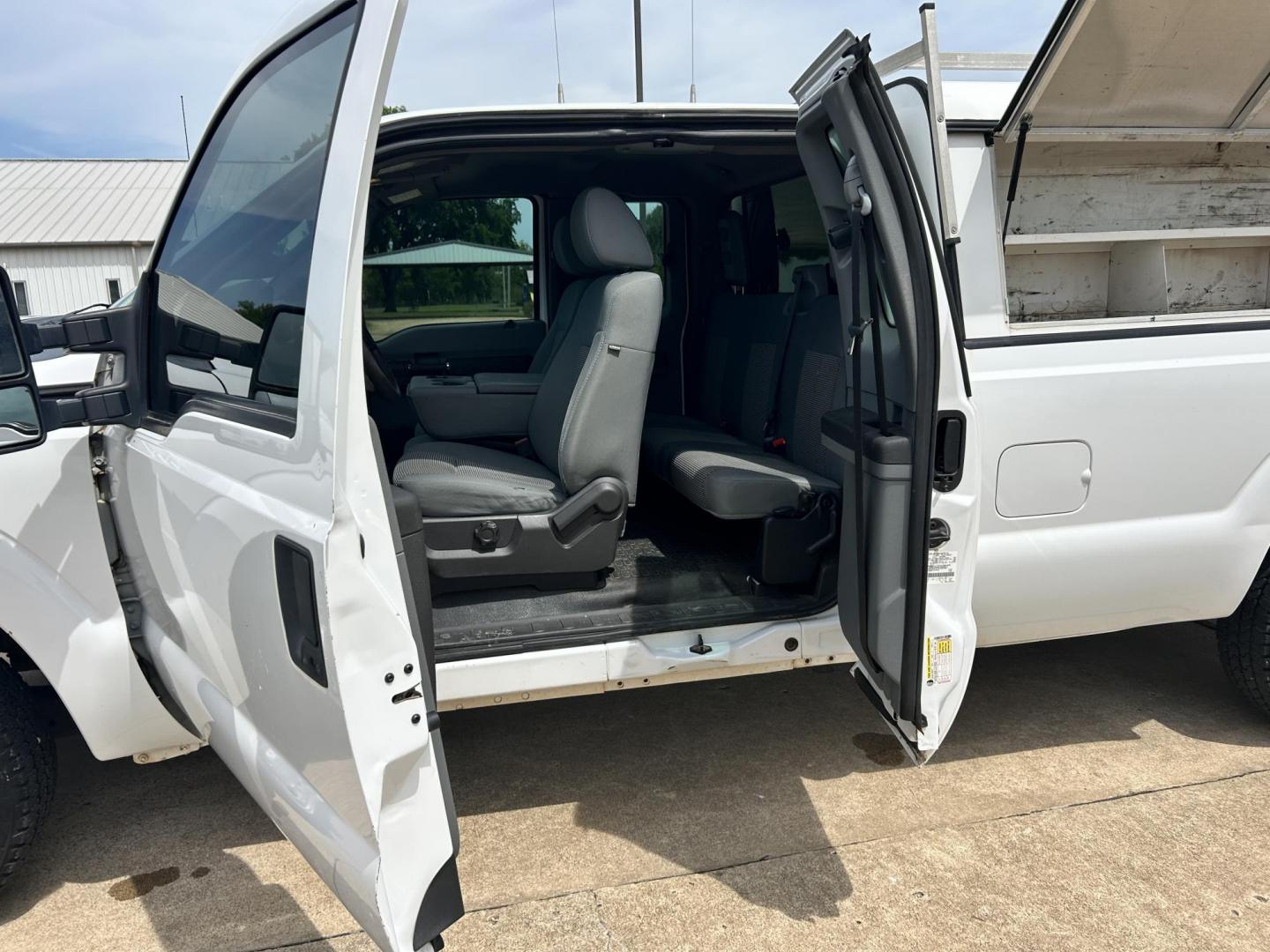 2012 White /Gray Ford F-250 SD SuperCab 2WD (1FT7X2A62CE) with an 6.2L V8 OHV 16V engine, 6-Speed Automatic transmission, located at 17760 Hwy 62, Morris, OK, 74445, (918) 733-4887, 35.609104, -95.877060 - 2012 FORD F250 SUPER DUTY RWD SERVICE CAMPER WITH A 6.2L V8 ENGINE. FEATURES KEYLESS ENTRY, MANUAL SEAT, CLOTH INTERIOR, POWER WINDOWS, POWER LOCKS, POWER MIRRORS, AM FM RADIO, CRUISE CONTROL, TRACTION CONTROL, SERVICE CAMPER WITH SHELVES AND BED SLIDE, AND TRAILER HITCH. FIRESTONE TIRES 246/70R17 A - Photo#14