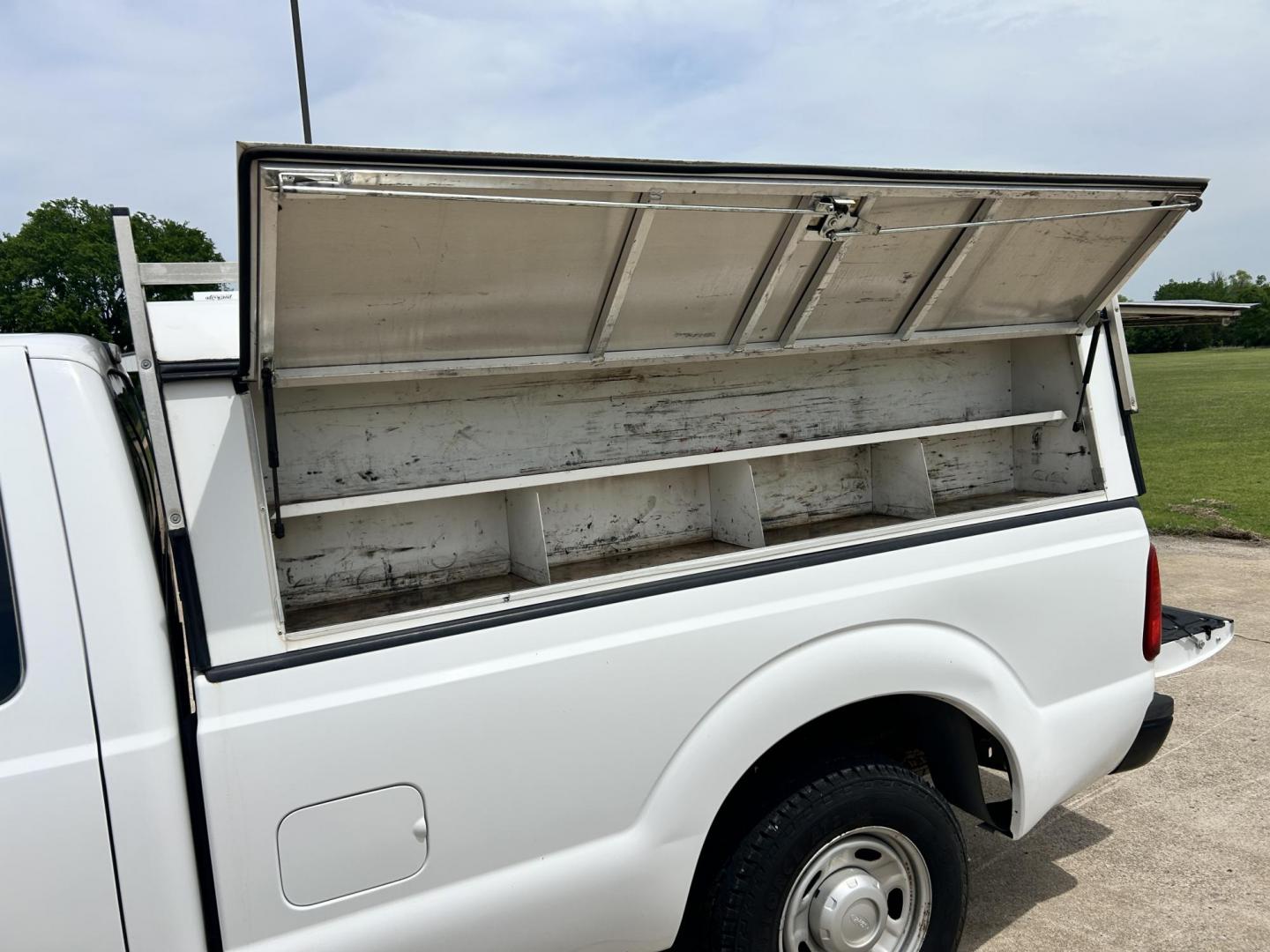 2012 White /Gray Ford F-250 SD SuperCab 2WD (1FT7X2A62CE) with an 6.2L V8 OHV 16V engine, 6-Speed Automatic transmission, located at 17760 Hwy 62, Morris, OK, 74445, (918) 733-4887, 35.609104, -95.877060 - 2012 FORD F250 SUPER DUTY RWD SERVICE CAMPER WITH A 6.2L V8 ENGINE. FEATURES KEYLESS ENTRY, MANUAL SEAT, CLOTH INTERIOR, POWER WINDOWS, POWER LOCKS, POWER MIRRORS, AM FM RADIO, CRUISE CONTROL, TRACTION CONTROL, SERVICE CAMPER WITH SHELVES AND BED SLIDE, AND TRAILER HITCH. FIRESTONE TIRES 246/70R17 A - Photo#15