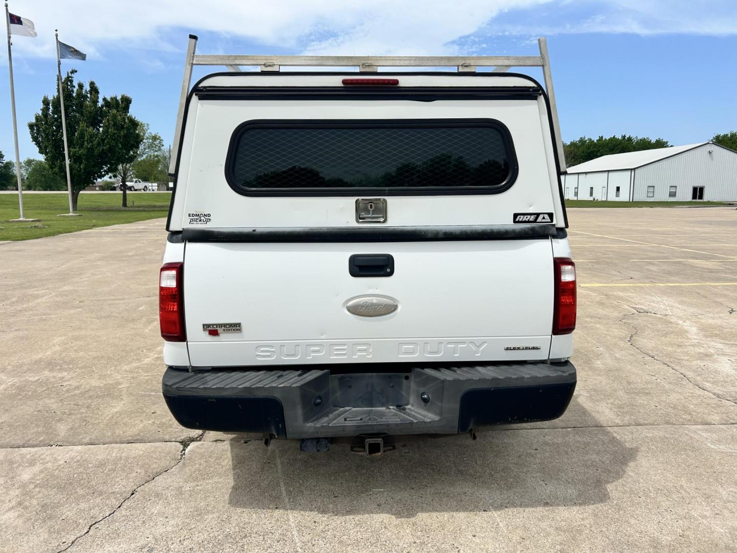 2012 White /Gray Ford F-250 SD SuperCab 2WD (1FT7X2A62CE) with an 6.2L V8 OHV 16V engine, 6-Speed Automatic transmission, located at 17760 Hwy 62, Morris, OK, 74445, (918) 733-4887, 35.609104, -95.877060 - 2012 FORD F250 SUPER DUTY RWD SERVICE CAMPER WITH A 6.2L V8 ENGINE. FEATURES KEYLESS ENTRY, MANUAL SEAT, CLOTH INTERIOR, POWER WINDOWS, POWER LOCKS, POWER MIRRORS, AM FM RADIO, CRUISE CONTROL, TRACTION CONTROL, SERVICE CAMPER WITH SHELVES AND BED SLIDE, AND TRAILER HITCH. FIRESTONE TIRES 246/70R17 A - Photo#5