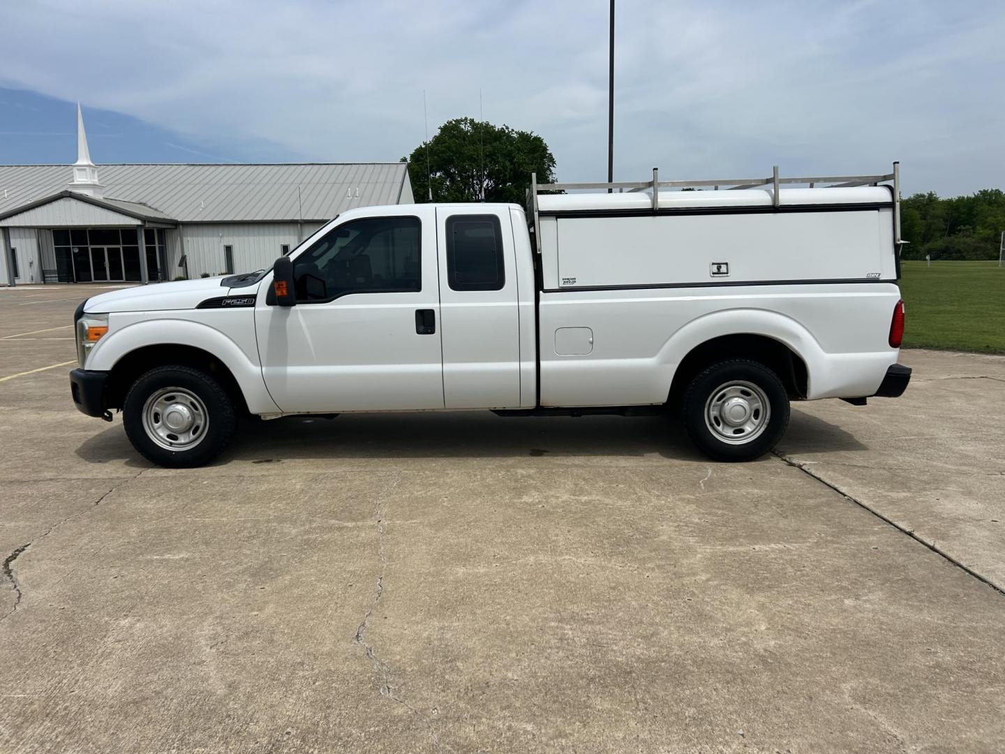 2012 White /Gray Ford F-250 SD SuperCab 2WD (1FT7X2A62CE) with an 6.2L V8 OHV 16V engine, 6-Speed Automatic transmission, located at 17760 Hwy 62, Morris, OK, 74445, (918) 733-4887, 35.609104, -95.877060 - 2012 FORD F250 SUPER DUTY RWD SERVICE CAMPER WITH A 6.2L V8 ENGINE. FEATURES KEYLESS ENTRY, MANUAL SEAT, CLOTH INTERIOR, POWER WINDOWS, POWER LOCKS, POWER MIRRORS, AM FM RADIO, CRUISE CONTROL, TRACTION CONTROL, SERVICE CAMPER WITH SHELVES AND BED SLIDE, AND TRAILER HITCH. FIRESTONE TIRES 246/70R17 A - Photo#7