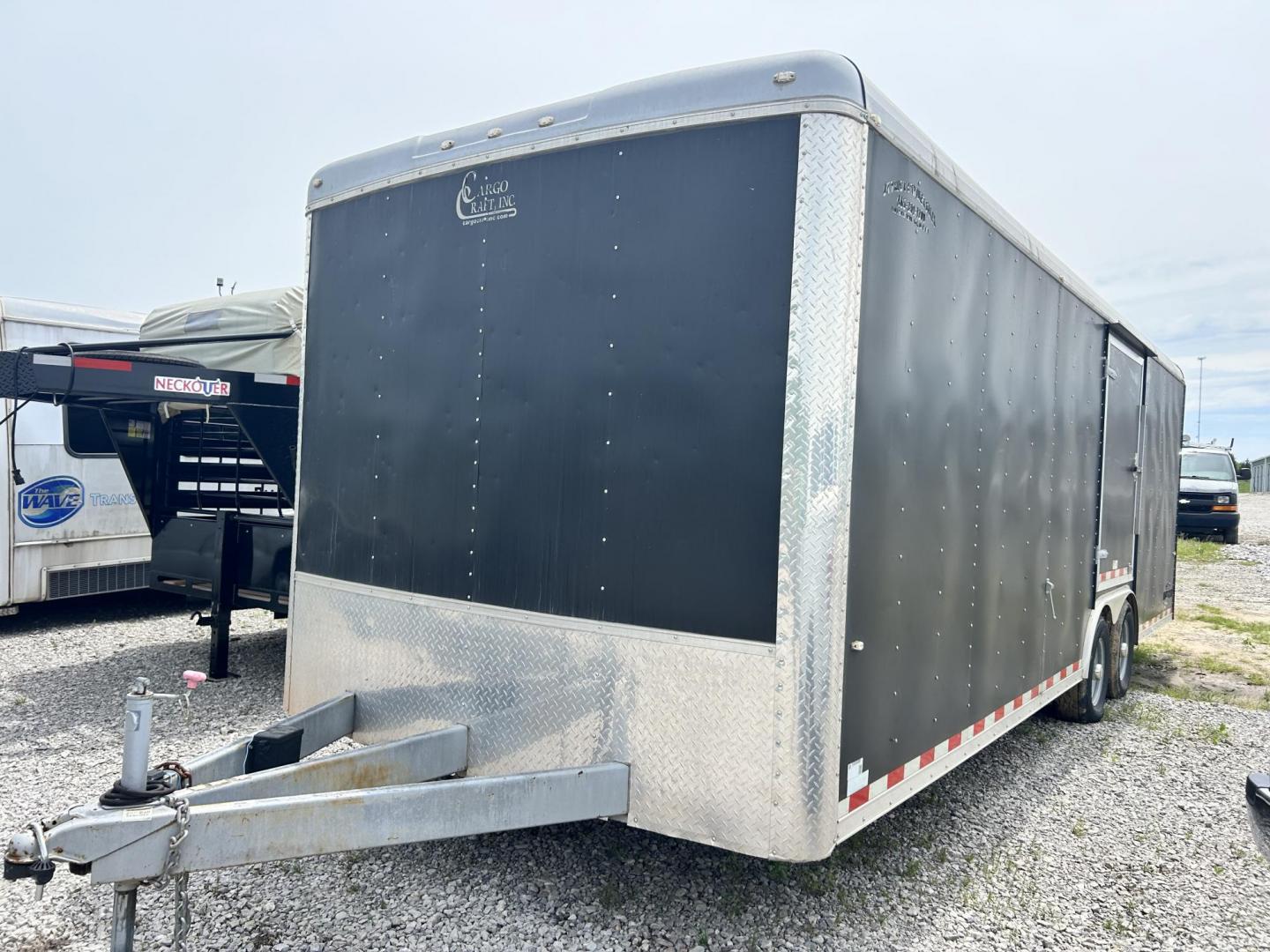 2018 BLACK Cargo Craft, Inc DRAGSTER CAR HAULER - (4D6EB2429JC) , located at 17760 Hwy 62, Morris, OK, 74445, 35.609104, -95.877060 - 2018 CARGO CRAFT, INC DRAGSTER CAR HAULER 24.5FTX8FT. TWO SIDE DOORS AND DUAL AXLES. PAYLOAD CAPACITY 10,400LBS, HITCH WEIGHT 6,000LBS, AND HITCH SIZE 2 5/16 BALL SIZE. ***BILL OF SALE ONLY*** $7,500 CALL RUSS, JONA OR HARLEY 918-733-4887 - Photo#0
