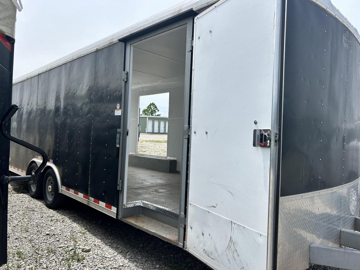 2018 BLACK Cargo Craft, Inc DRAGSTER CAR HAULER - (4D6EB2429JC) , located at 17760 Hwy 62, Morris, OK, 74445, 35.609104, -95.877060 - 2018 CARGO CRAFT, INC DRAGSTER CAR HAULER 24.5FTX8FT. TWO SIDE DOORS AND DUAL AXLES. PAYLOAD CAPACITY 10,400LBS, HITCH WEIGHT 6,000LBS, AND HITCH SIZE 2 5/16 BALL SIZE. ***BILL OF SALE ONLY*** $7,500 CALL RUSS, JONA OR HARLEY 918-733-4887 - Photo#12
