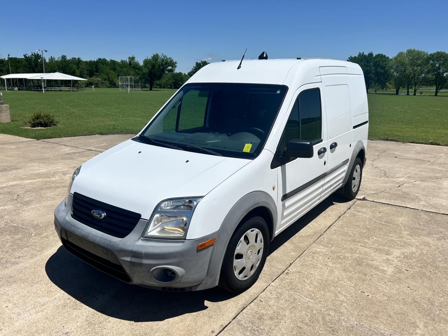 2012 White /Gray Ford Transit Connect XL with Rear Door Glass (NM0LS7AN8CT) with an 2.0L L4 DOHC 16V engine, 4-Speed Automatic transmission, located at 17760 Hwy 62, Morris, OK, 74445, (918) 733-4887, 35.609104, -95.877060 - 2012 FORD TRANSIT CONNECT HAS THE 2.0L ENGINE. THIS IS A DEDICATED CNG THAT ONLY RUNS ON COMPRESSED NATURAL GAS AND IS NOT EQUIPPED TO RUN ON GASOLINE. IT FEATURES MANUAL WINDOWS, MANUAL LOCKS, MANUAL SEATS, CLOTH INTERIOR, BACKUP CAMERA, AM/FM RADIO, STORAGE DRAWERS IN CARGO AREA, 205/65R15 TIRES - Photo#0