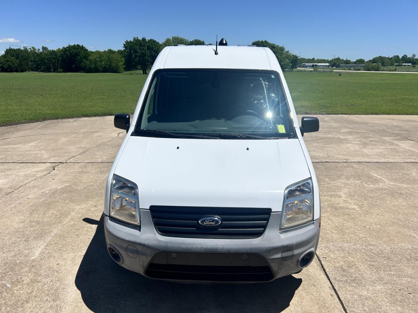 2012 White /Gray Ford Transit Connect XL with Rear Door Glass (NM0LS7AN8CT) with an 2.0L L4 DOHC 16V engine, 4-Speed Automatic transmission, located at 17760 Hwy 62, Morris, OK, 74445, (918) 733-4887, 35.609104, -95.877060 - 2012 FORD TRANSIT CONNECT HAS THE 2.0L ENGINE. THIS IS A DEDICATED CNG THAT ONLY RUNS ON COMPRESSED NATURAL GAS AND IS NOT EQUIPPED TO RUN ON GASOLINE. IT FEATURES MANUAL WINDOWS, MANUAL LOCKS, MANUAL SEATS, CLOTH INTERIOR, BACKUP CAMERA, AM/FM RADIO, STORAGE DRAWERS IN CARGO AREA, 205/65R15 TIRES - Photo#1