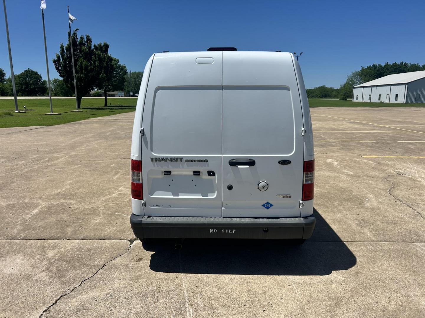 2012 White /Gray Ford Transit Connect XL with Rear Door Glass (NM0LS7AN8CT) with an 2.0L L4 DOHC 16V engine, 4-Speed Automatic transmission, located at 17760 Hwy 62, Morris, OK, 74445, (918) 733-4887, 35.609104, -95.877060 - 2012 FORD TRANSIT CONNECT HAS THE 2.0L ENGINE. THIS IS A DEDICATED CNG THAT ONLY RUNS ON COMPRESSED NATURAL GAS AND IS NOT EQUIPPED TO RUN ON GASOLINE. IT FEATURES MANUAL WINDOWS, MANUAL LOCKS, MANUAL SEATS, CLOTH INTERIOR, BACKUP CAMERA, AM/FM RADIO, STORAGE DRAWERS IN CARGO AREA, 205/65R15 TIRES - Photo#5