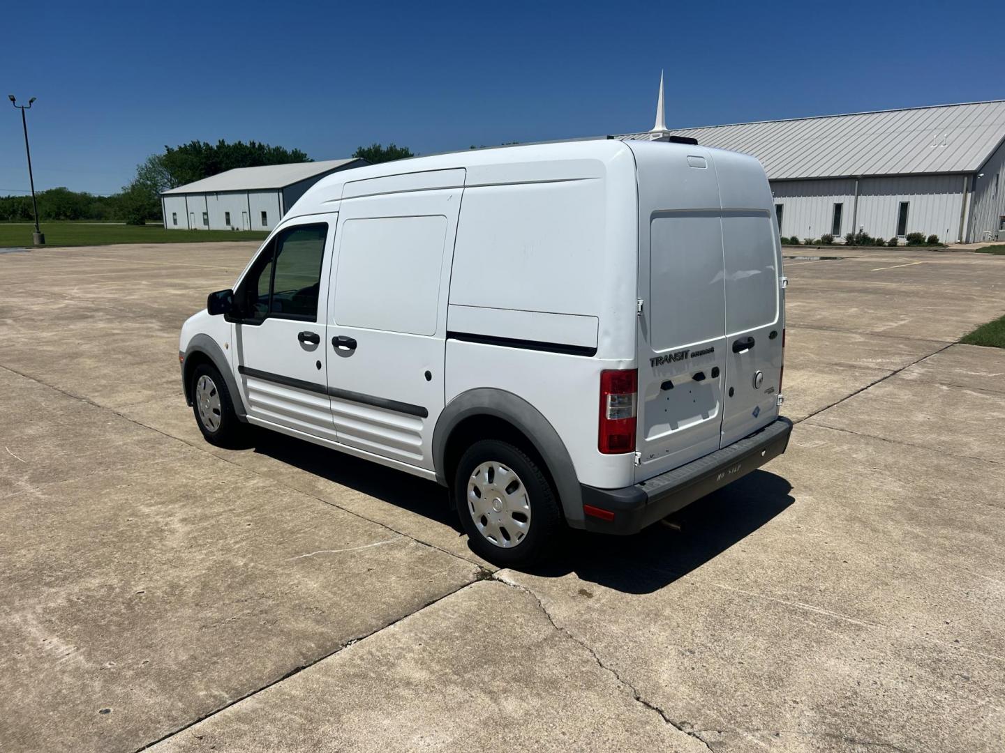 2012 White /Gray Ford Transit Connect XL with Rear Door Glass (NM0LS7AN8CT) with an 2.0L L4 DOHC 16V engine, 4-Speed Automatic transmission, located at 17760 Hwy 62, Morris, OK, 74445, (918) 733-4887, 35.609104, -95.877060 - 2012 FORD TRANSIT CONNECT HAS THE 2.0L ENGINE. THIS IS A DEDICATED CNG THAT ONLY RUNS ON COMPRESSED NATURAL GAS AND IS NOT EQUIPPED TO RUN ON GASOLINE. IT FEATURES MANUAL WINDOWS, MANUAL LOCKS, MANUAL SEATS, CLOTH INTERIOR, BACKUP CAMERA, AM/FM RADIO, STORAGE DRAWERS IN CARGO AREA, 205/65R15 TIRES - Photo#6