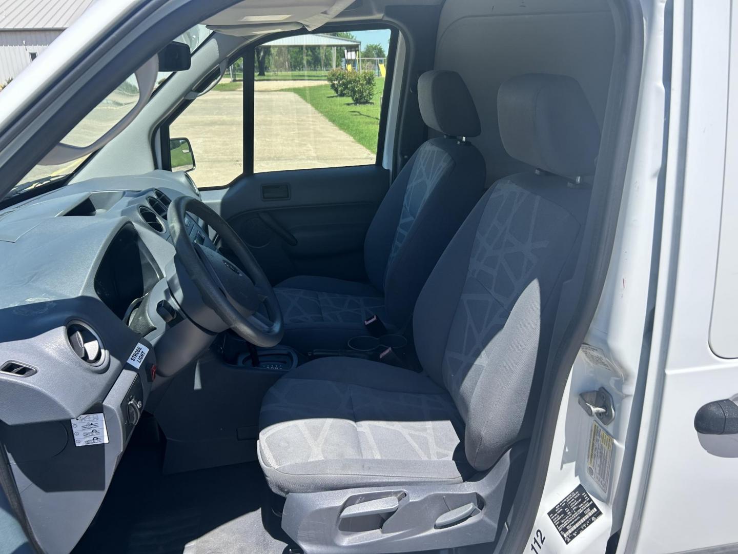 2012 White /Gray Ford Transit Connect XL with Rear Door Glass (NM0LS7AN8CT) with an 2.0L L4 DOHC 16V engine, 4-Speed Automatic transmission, located at 17760 Hwy 62, Morris, OK, 74445, (918) 733-4887, 35.609104, -95.877060 - 2012 FORD TRANSIT CONNECT HAS THE 2.0L ENGINE. THIS IS A DEDICATED CNG THAT ONLY RUNS ON COMPRESSED NATURAL GAS AND IS NOT EQUIPPED TO RUN ON GASOLINE. IT FEATURES MANUAL WINDOWS, MANUAL LOCKS, MANUAL SEATS, CLOTH INTERIOR, BACKUP CAMERA, AM/FM RADIO, STORAGE DRAWERS IN CARGO AREA, 205/65R15 TIRES - Photo#8