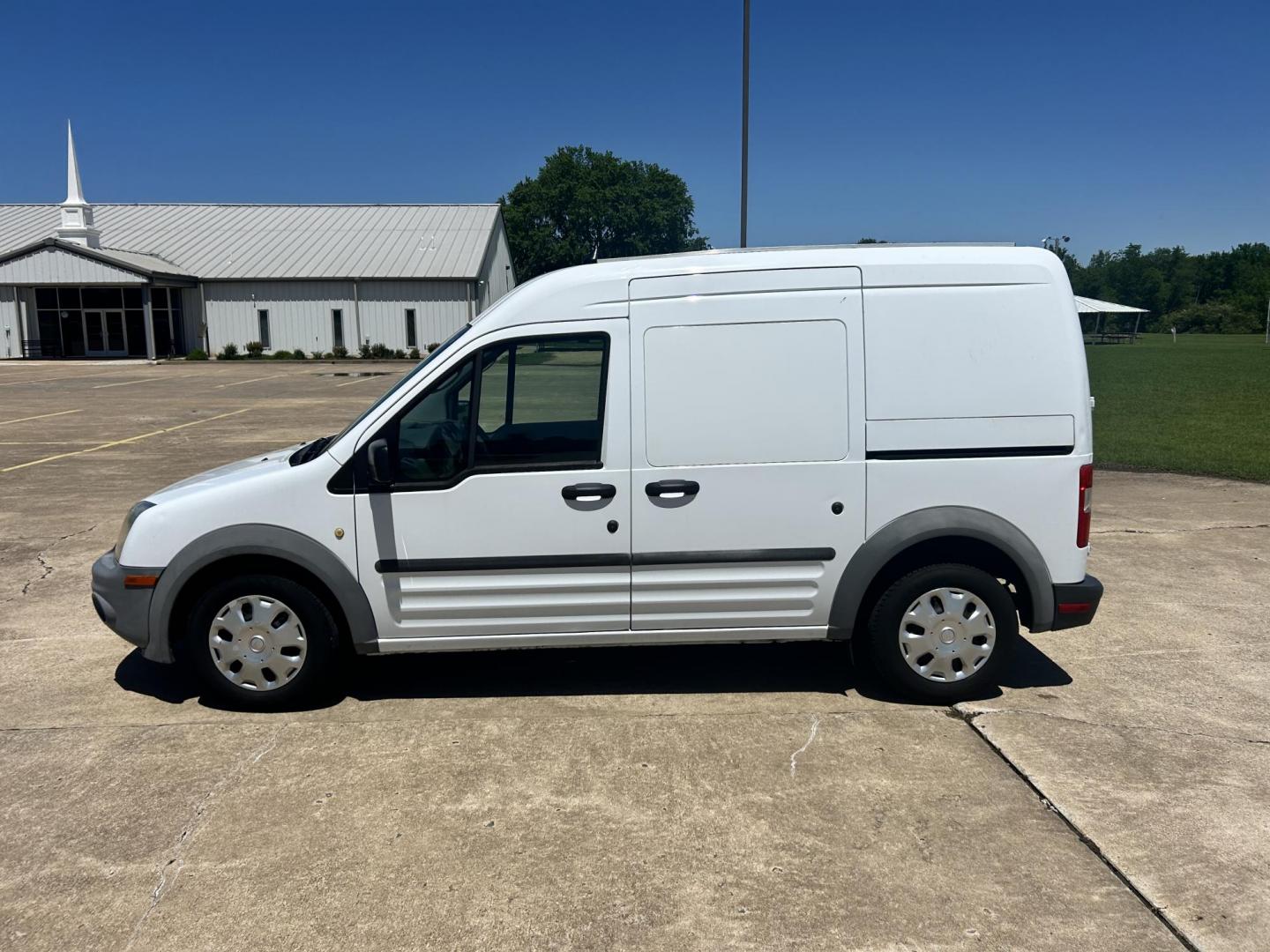 2012 White /Gray Ford Transit Connect XL with Rear Door Glass (NM0LS7AN8CT) with an 2.0L L4 DOHC 16V engine, 4-Speed Automatic transmission, located at 17760 Hwy 62, Morris, OK, 74445, (918) 733-4887, 35.609104, -95.877060 - 2012 FORD TRANSIT CONNECT HAS THE 2.0L ENGINE. THIS IS A DEDICATED CNG THAT ONLY RUNS ON COMPRESSED NATURAL GAS AND IS NOT EQUIPPED TO RUN ON GASOLINE. IT FEATURES MANUAL WINDOWS, MANUAL LOCKS, MANUAL SEATS, CLOTH INTERIOR, BACKUP CAMERA, AM/FM RADIO, STORAGE DRAWERS IN CARGO AREA, 205/65R15 TIRES - Photo#7