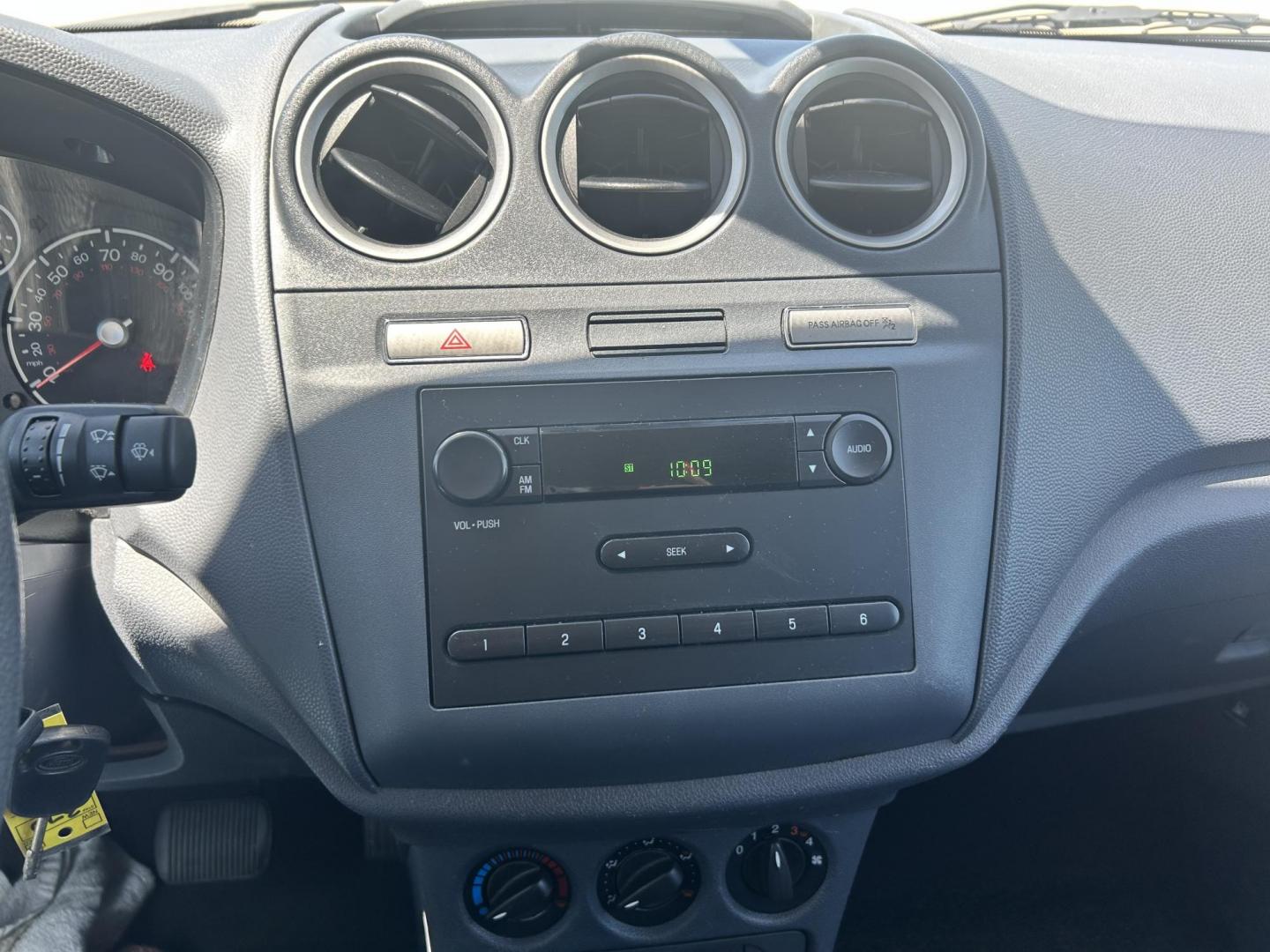 2012 White /Gray Ford Transit Connect XL with Rear Door Glass (NM0LS7AN8CT) with an 2.0L L4 DOHC 16V engine, 4-Speed Automatic transmission, located at 17760 Hwy 62, Morris, OK, 74445, (918) 733-4887, 35.609104, -95.877060 - 2012 FORD TRANSIT CONNECT HAS THE 2.0L ENGINE. THIS IS A DEDICATED CNG THAT ONLY RUNS ON COMPRESSED NATURAL GAS AND IS NOT EQUIPPED TO RUN ON GASOLINE. IT FEATURES MANUAL WINDOWS, MANUAL LOCKS, MANUAL SEATS, CLOTH INTERIOR, BACKUP CAMERA, AM/FM RADIO, STORAGE DRAWERS IN CARGO AREA, 205/65R15 TIRES - Photo#11